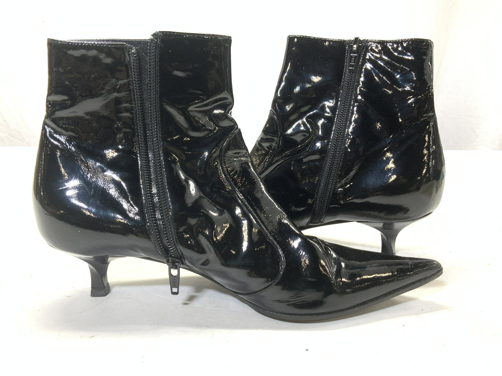 CASADEI Patent Leather Heel Boots,Italy: Black patent leather ladies fashion ankle boots, pointed tow . Appear seldom used. 1.75 in. Ht kitten heel, Signed Made in Italy and CASADEI, vero cuoio , size 7.5 B. Ankle height 5.25 in. App ( measu
