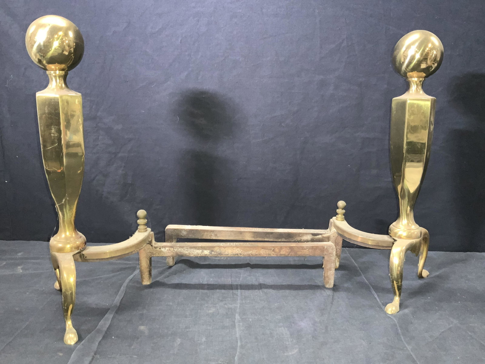 Puritan SGN Vintage Brass & Iron AndIron: Pair of Vintage Andirons. Part Brass and Folding mechanism is made of iron. Marked Puritan on iron. Approximately 17 inches tall and 19.5 inches long. Vintage Andirons, Vintage furniture, Vintage Fire