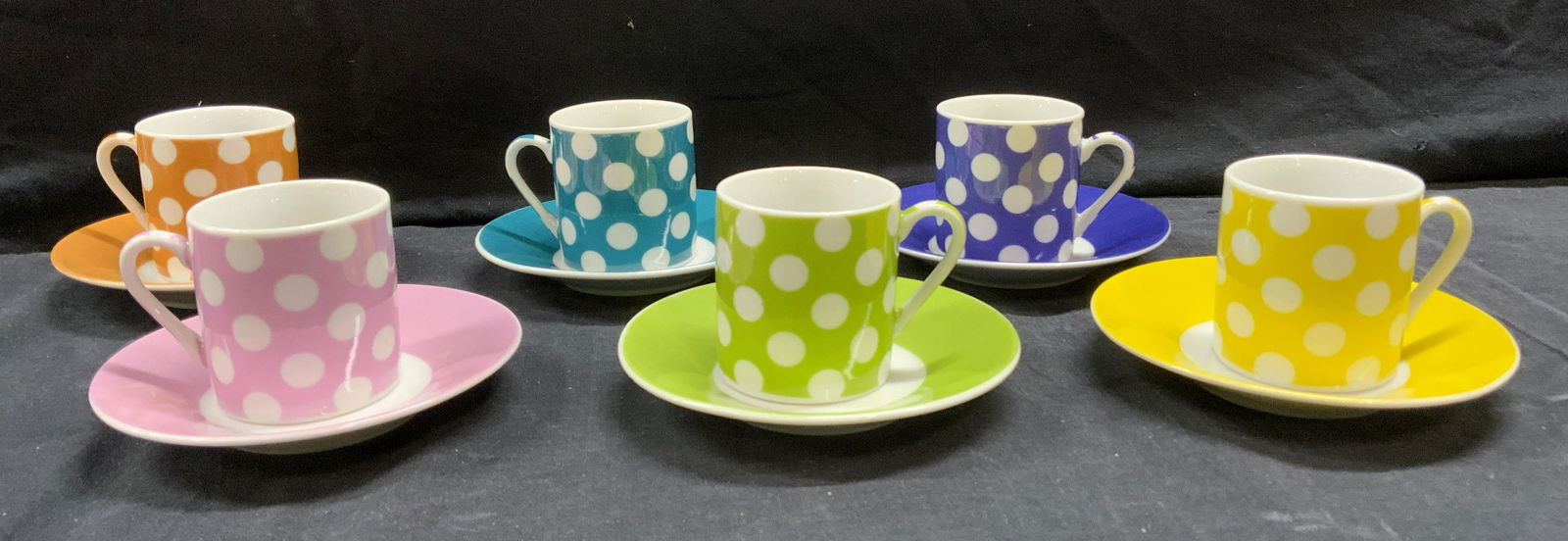 set 6 Espresso Cups & Saucers: set 6 Espresso Cups & Saucers, stamped classiccoffe&tea to underside, saucers measure 4 inches in diameter, cups measure 2 3/4 wide x 2 inches tall. In blue polka dot box. Espresso cups, espresso tea