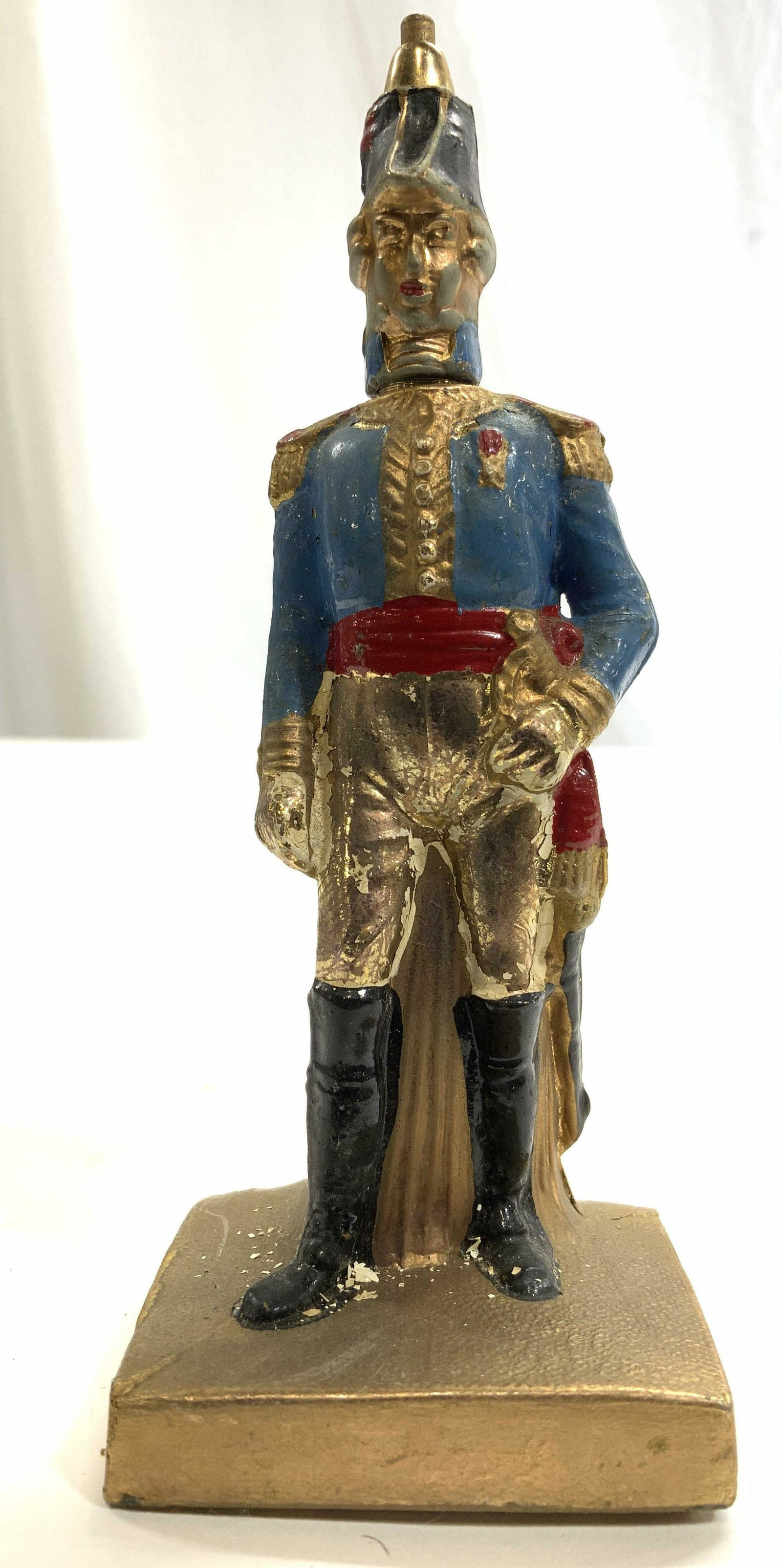 Vintage Hand Painted Metal Soldier Pen & Holder: Pen & Holder is vintage possibly antique. Piece appears to be hand painted head of soldier is back end of pen. Piece is metal. Measures approx 5 inches tall 2 inches wide & deep. Vintage pen, metal pe
