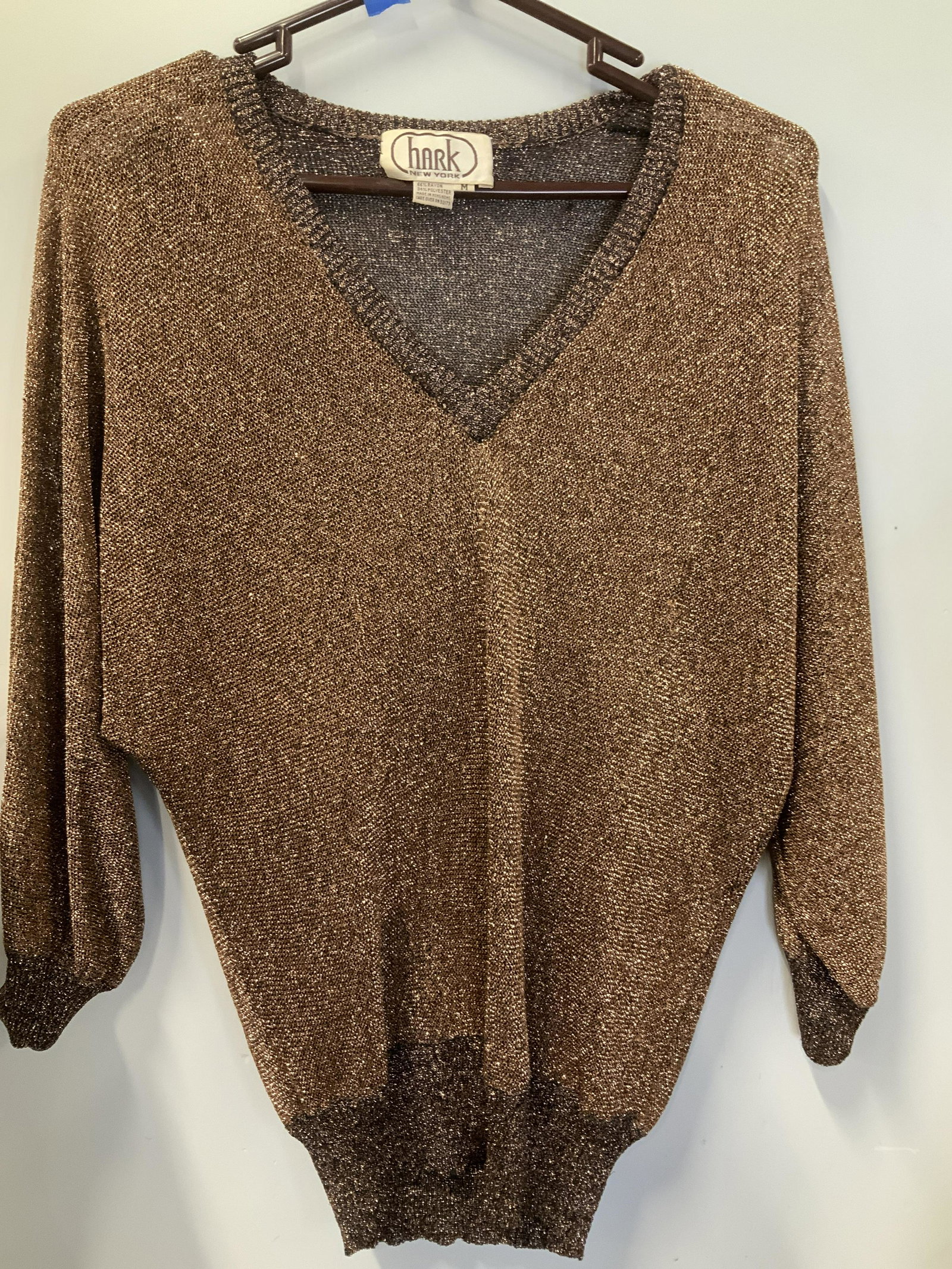 HARK Vtg Metallic Bronze Rayon/Poly Sweater: Vintage metallic knit sweater with V neck, original designer label attached, very 70s disco. Size Medium. Needs repair along seem hem. Property of Manhattan, NY estate Wearables, Hark Rayon Polyester 