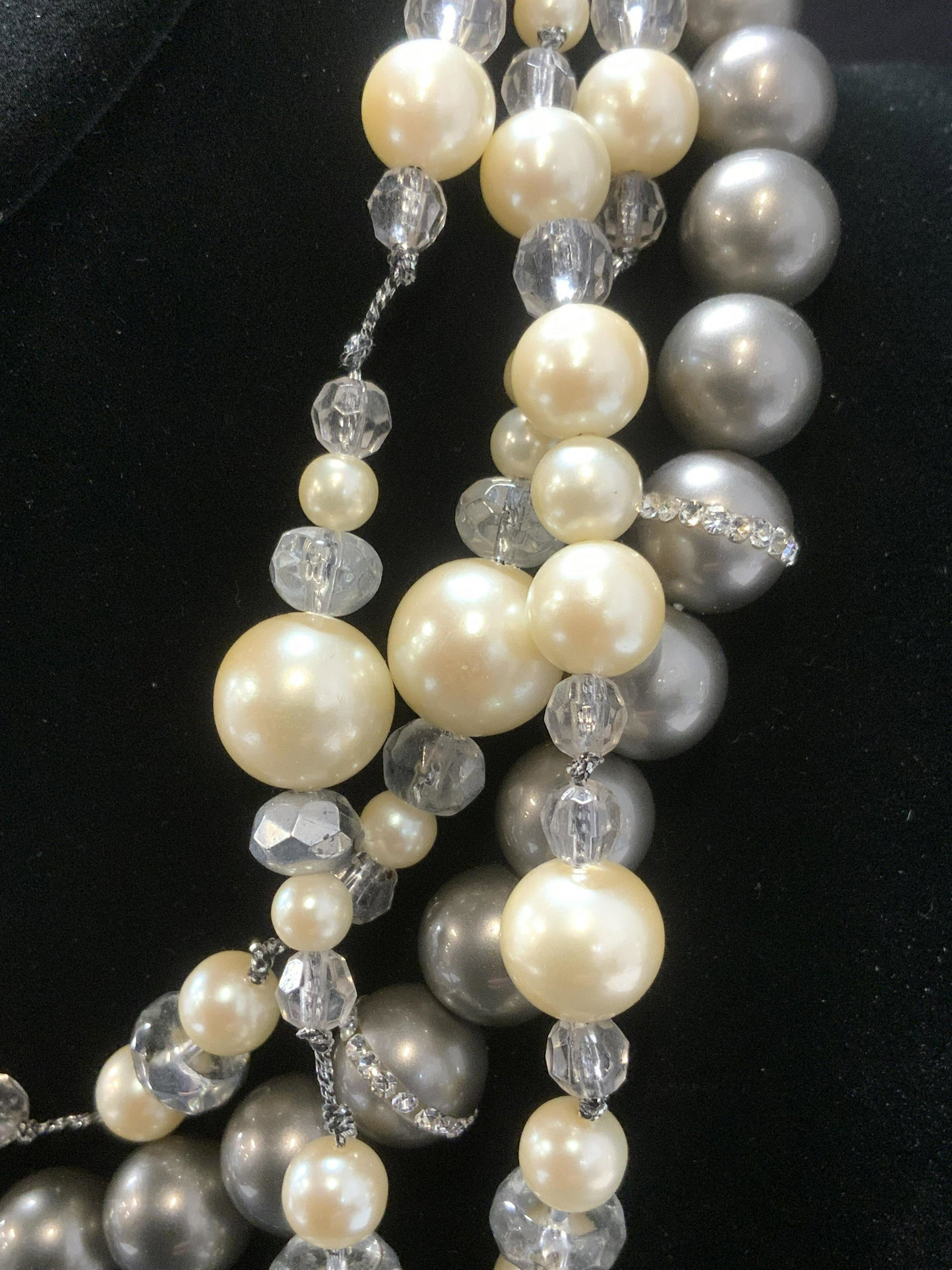 Lot of 2 Pearlescent Necklaces: Lot of 2 Pearlescent Necklaces, one with grey pearlescent beads and rhinestone accents, lobster claw clasp, silver toned metal strand, measures approx 17 1/2 - 19 in. long, length adjustable, pearlesc