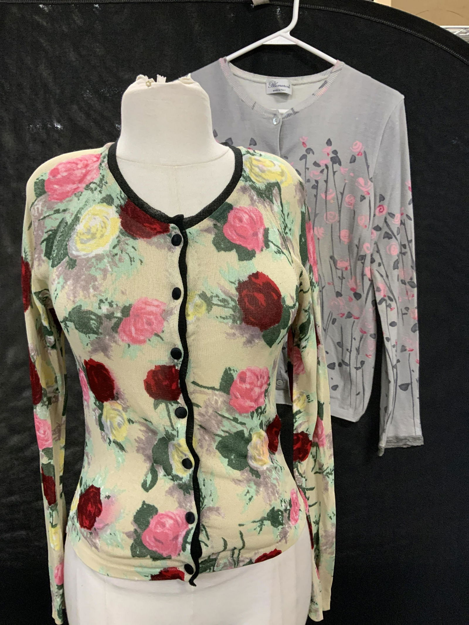Lot 2 BLUMARINE Floral Rayon Cardigans, Italy: Button down floral cardigans, both designer BLUMARINE and both made in Italy. Rose pattern 100% rayon knit, size Small. Pink, red and yellow roses on light green background. Grey cardigan with pink fl
