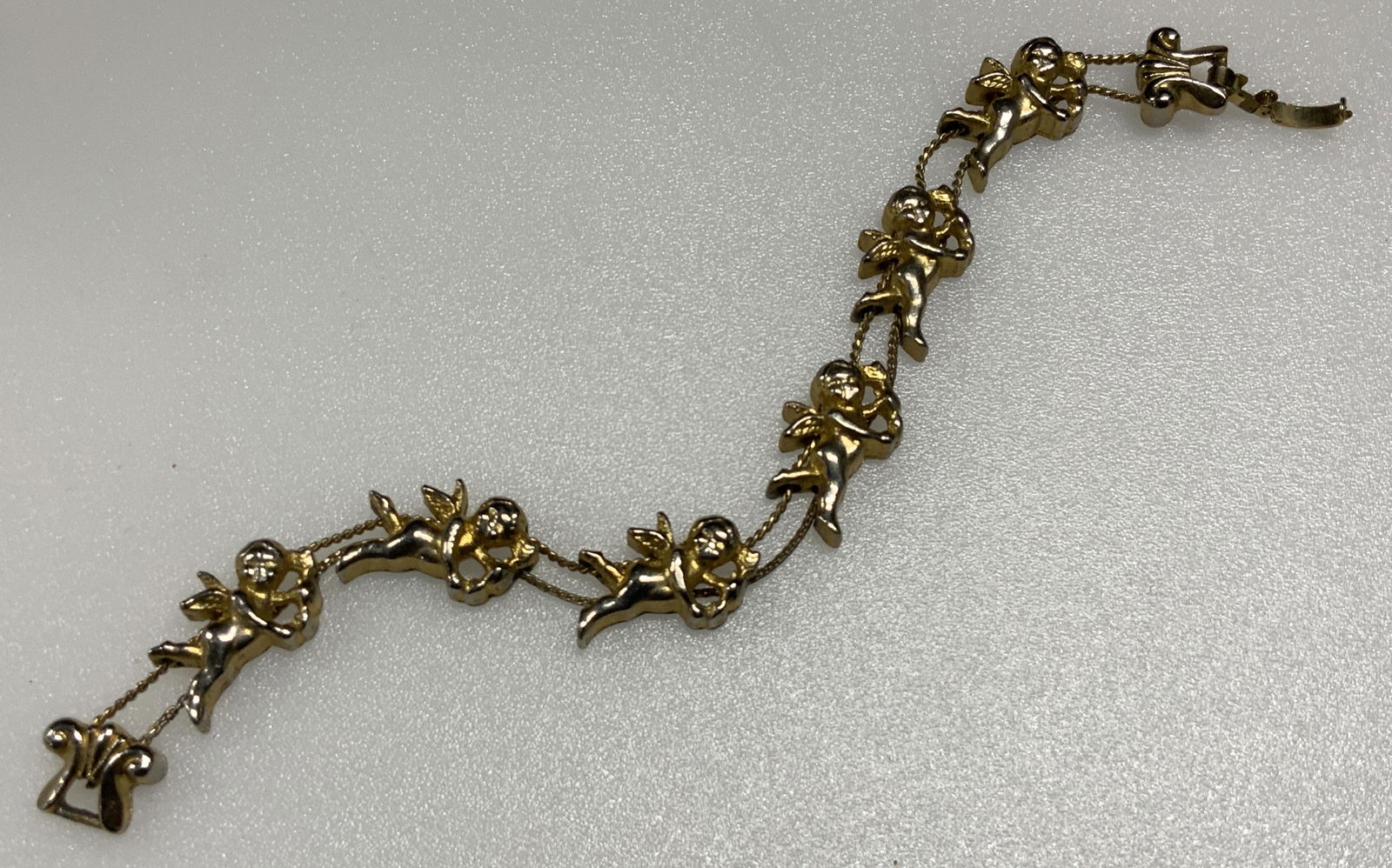 Gold Toned Cherub Charm Bracelet (1 of 4)
