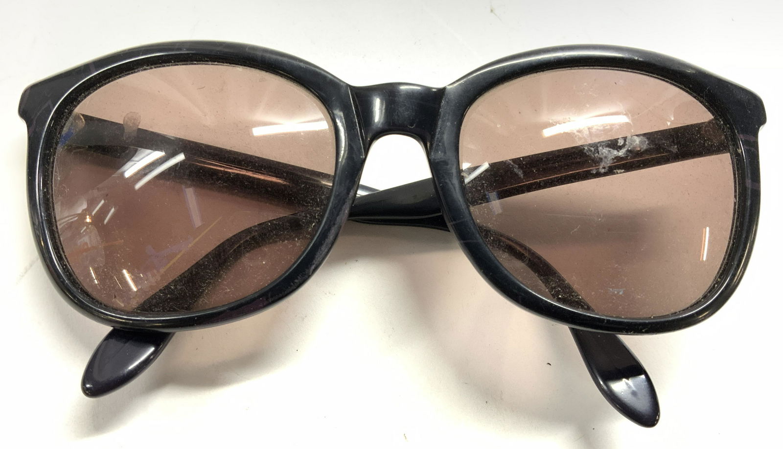 NORMA KAMALI Sunglasses: Arm of sunglasses read NORMA KAMALI. Sunglasses measure approx 5.75 inches wide 5.25 inches deep 2 inches tall. Sunglasses, shades, fashion accessories, Norma KAMALI, Norma KAMALI sunglasses, Norma KA