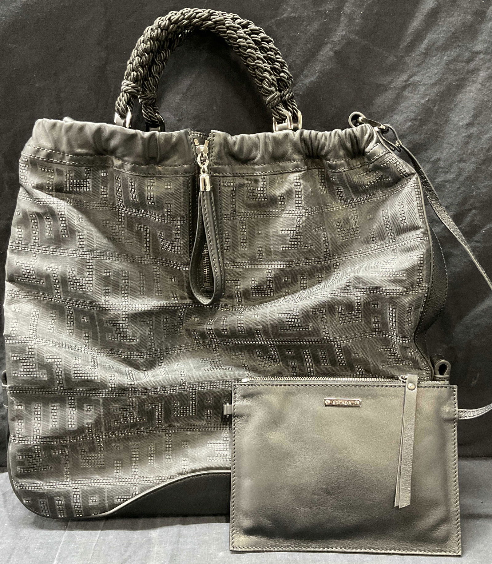 ESCADA Black Hand Bag and Wallet: ESCADA Black Hand Bag and Wallet, black leather wallet attached to hand bag with leather details, tag reads ESCADA, Made In Italy, wallet is detachable to become a small cross body bag, functional zip