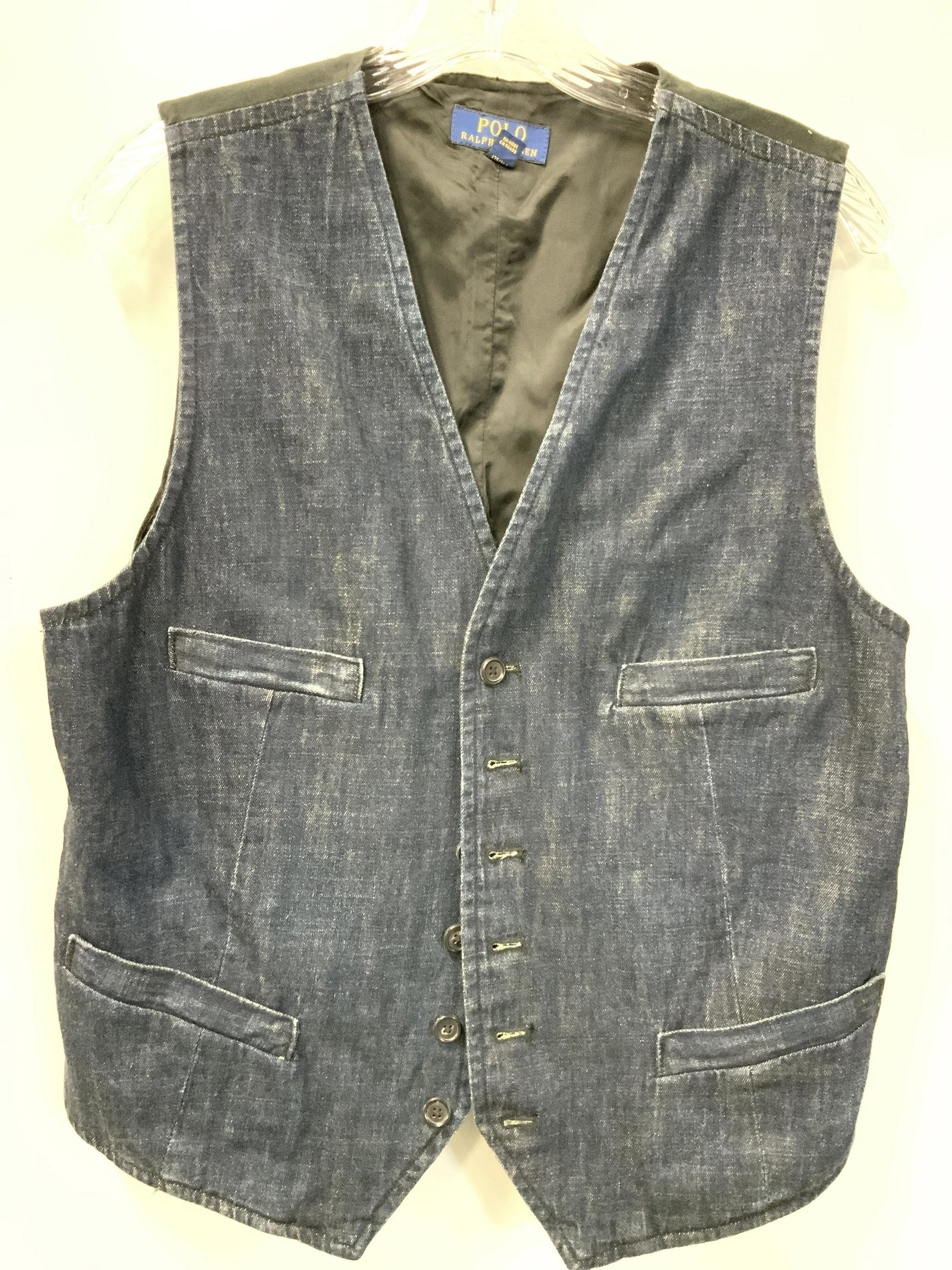POLO By Ralph Lauren 40R Cotton Vest: Size 40 R Ralph Lauren Polo Vest, with a dark blue denim resemblance with a black backing. Tags reads Polo Ralph Lauren, 40R. Material tag is marked 100% Cotton. Pockets are stitched closed. Ralph Lau
