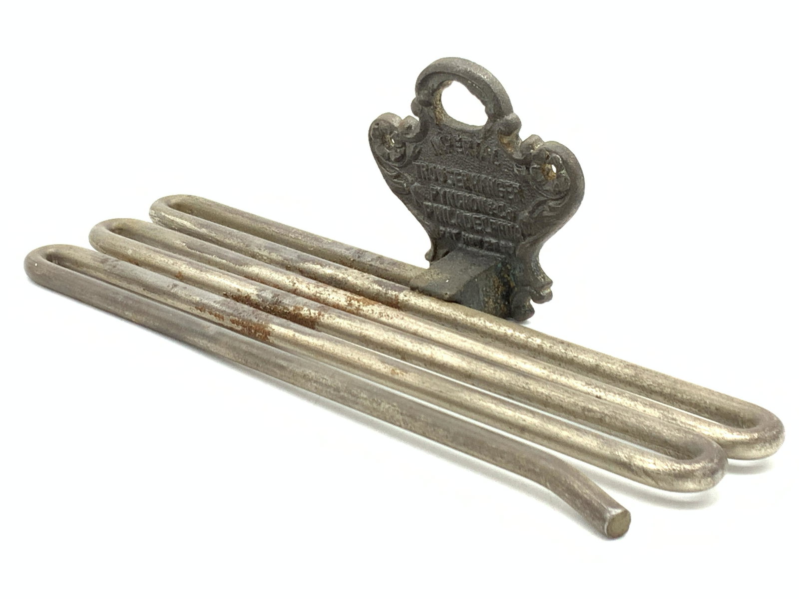 Vintage Imperial Trouser Manager Pants Hanger: Vintage cast iron pants hanger with white metal multi curved rod with hanging plaque that reads Imperial, Trouser Manager, Pynchons & Co Philadelphia. Approximately 9.25 inches wide and 3.75 inches lo