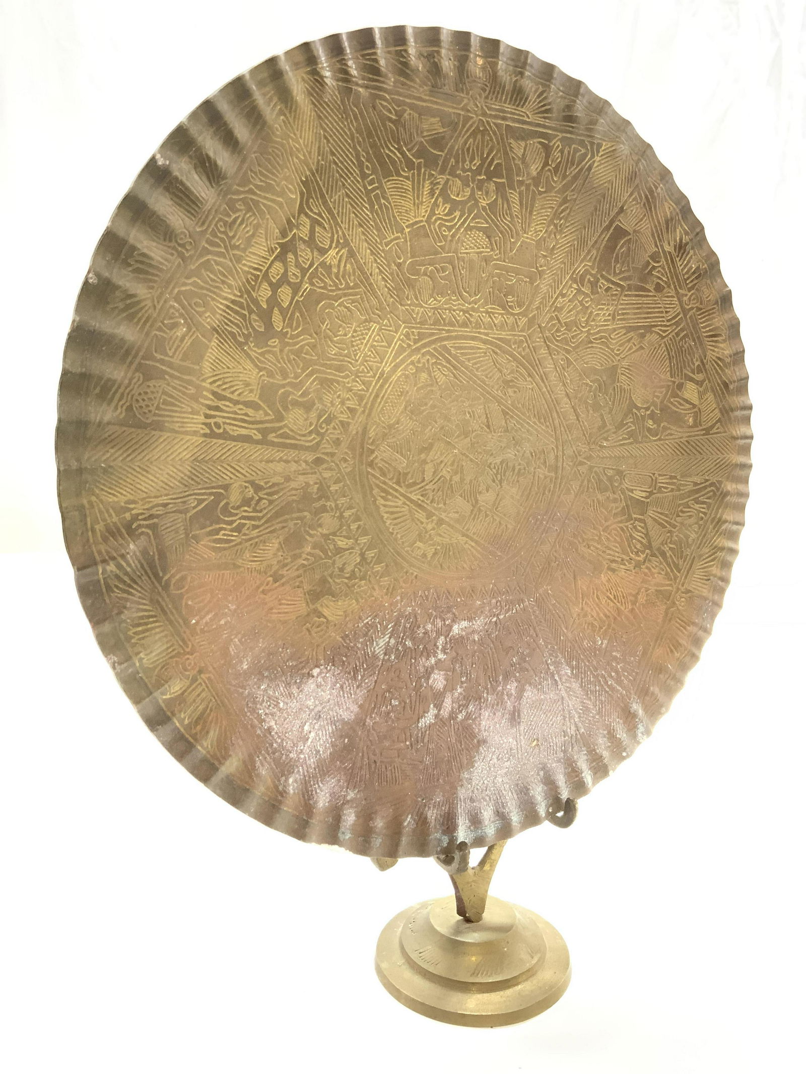 Vintage Brass Relief W Brass Stand: Lot includes brass relief and stand. Relief is gold toned with intricate etched detail. Stand is gold toned and appears to be brass. Relief measures approx 8 inches diameter. Relief, vintage relief, r