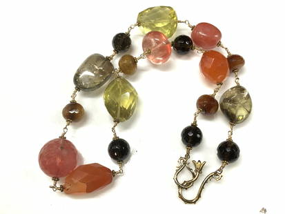 SAKS 5th AVE Faceted Quartz Necklace, Org Box: SAKS 5th AVE Faceted Quartz Necklace, Org BoxLuxury hand beaded natural stone choker necklace. 17 in. Large faceted Quartz beads and polished natural stone beads. Largest bead is the lemon Quartz at 1