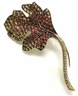 Sapphire & Diamond 18k Leaf Brooch, Lux Bond Box: 2 x 7/8 in. Vintage gemstone oak leaf brooch that comes in a black velour Lux, Bond & Green jewelry Box. Stem has pave diamonds, faceted . Tests positive for diamonds on gem tester, leaf has