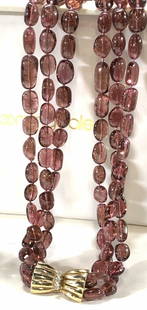 Tourmaline Multi Strand Neck w Gold Diamond Clasp: Vintage sought after watermelon pink tourmaline bead necklace, Polished gemstones and comes in a white leather Bloomingdales Gift box. Graduated gemstones, avg size 15 x10 mm , necklace 17 in. long