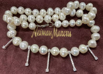 Cultured White Pearl Necklace w Diamond Accents: Luxury cultured white pearl necklace that comes on a burgundy suede jewelry pouch marked Neiman Marcus. Pearls are bright white with lustrous shine, each pearl matching in size, app 10 x 8 mm. 14 k