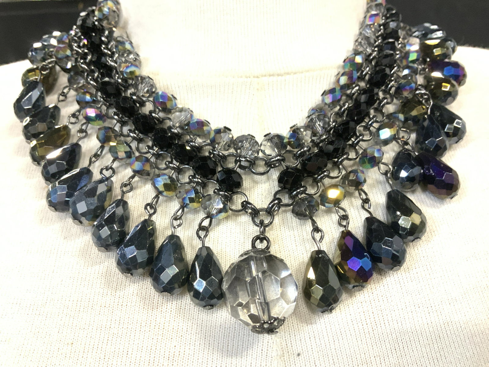 Chico’s’ s Aurora Borealis Statement Necklace, nwt: Signed Chicos Chunky beaded necklace, full of iridescent Aurora Borealis beads set in gun teal. Rainbow iridescence . New with tag and comes with a large gift pouch. Necklace is adjustable 12-14.5 in.