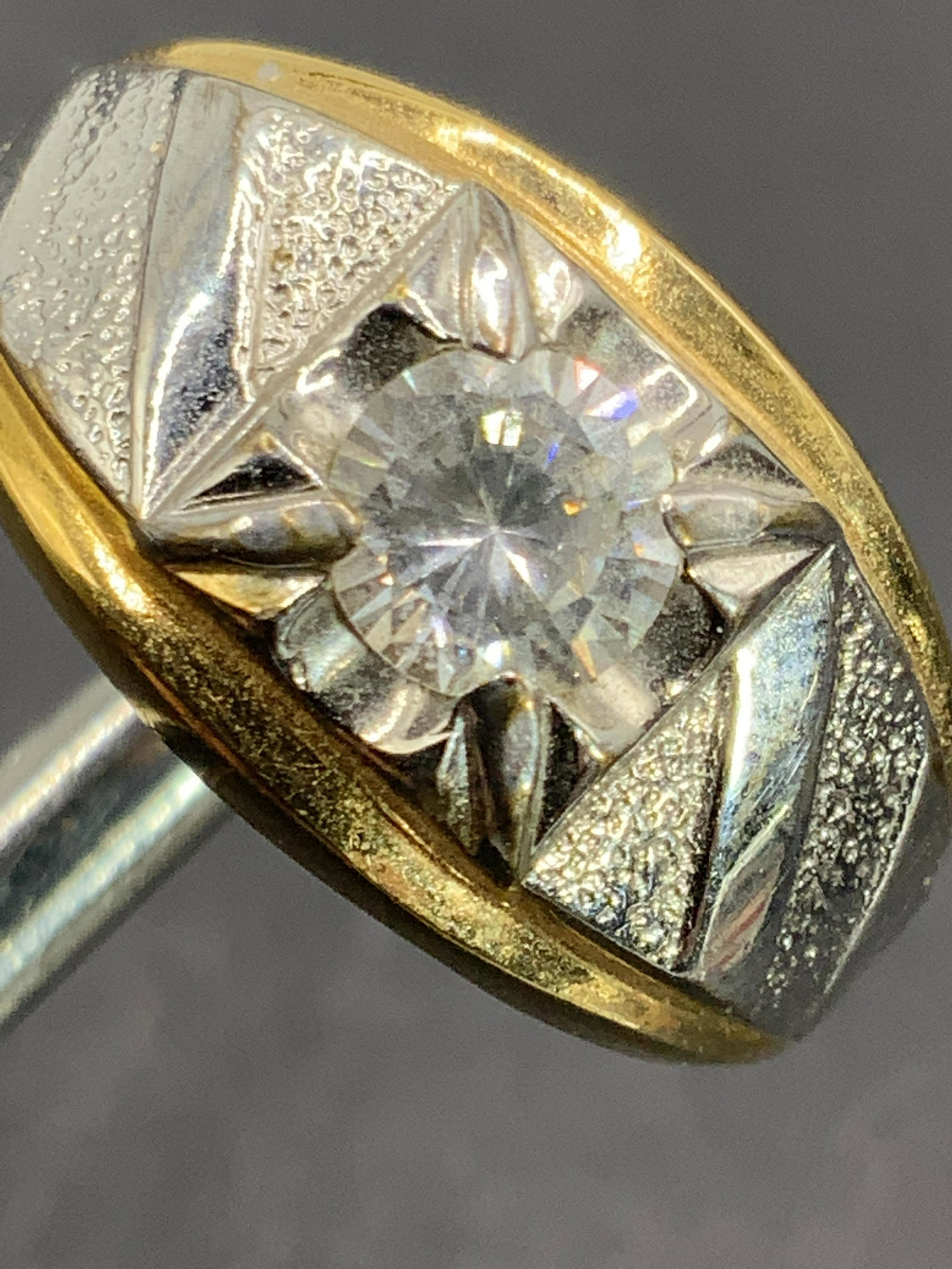 Vintage Yellow & White 14K Gold HGE Crystal Ring: A vintage electroplated white & yellow gold ring with a colorless faceted solitaire crystal at the center. Crystal is prong set. Interior band marked 14K HGE (heavy gold electroplate). Other mark ille