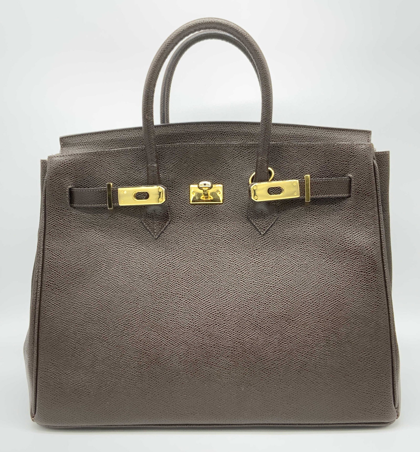 MARQUESA Chocolate Leather Handbag, Italy: MARQUESA Chocolate Pebble Leather Handbag, made in Italy, never used, dual top handles, with cinch & hook top closure, gold toned hardware, adorned with lock & key, interior lined with tan leatherette