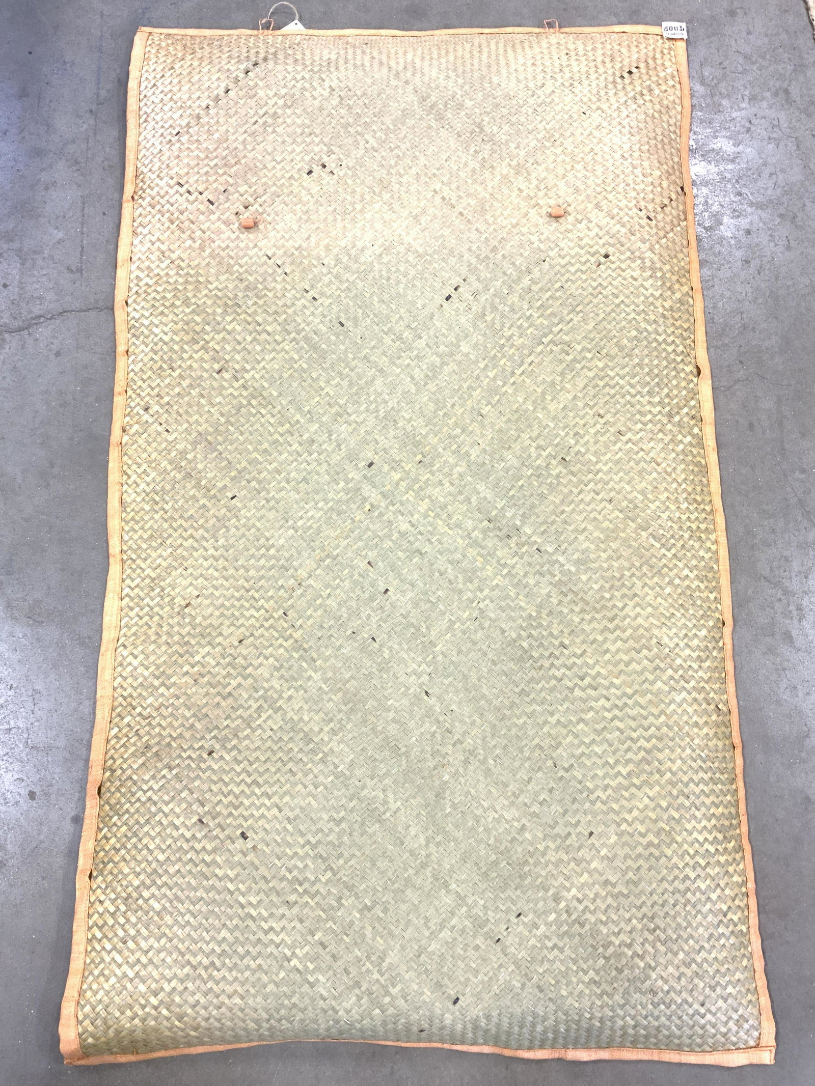 Vintage Woven Palm Rug: Tag reads SOUL TRADING Rug is vintage, piece appears to be woven Palm/ straw. Piece has 1 orange side & 1 sand toned side. Rug measures approx 58 inches long 33 inches wide. Rug, carpet, area rug, hom