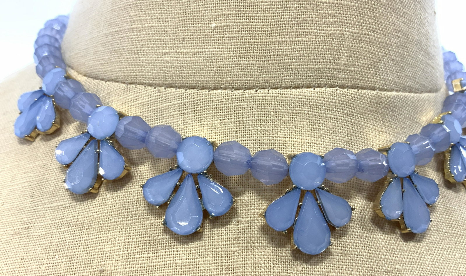 Light Blue Beaded & Crystal Necklace: Light Blue Beaded & Crystal Necklace, gold toned hardware, crystal in prong setting, lobster claw clasp, adjustable length measures from approx 16 to 19 3/4in. Beaded and crystal necklace, crystal jew