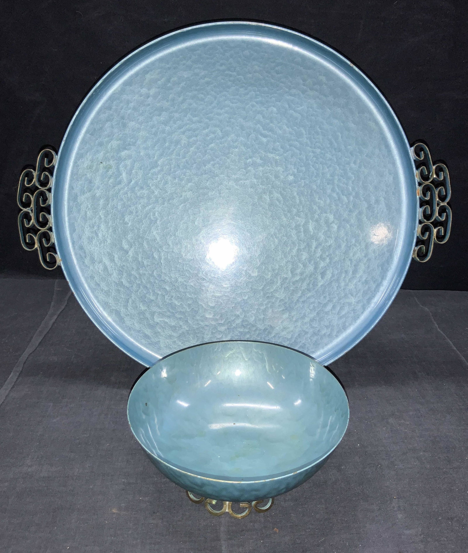 Set 2 MOIRE GLAZE KYES Hand Made Bowl & Tray: Set 2 MOIRE GLAZE KYES Hand Made Bowl & Tray. 1 bowl and 1 matching tray. Blue toned finish with curled handles. Marked on underside of both pieces Moire Glaze Kyes Handmade Pasadina California. Tray