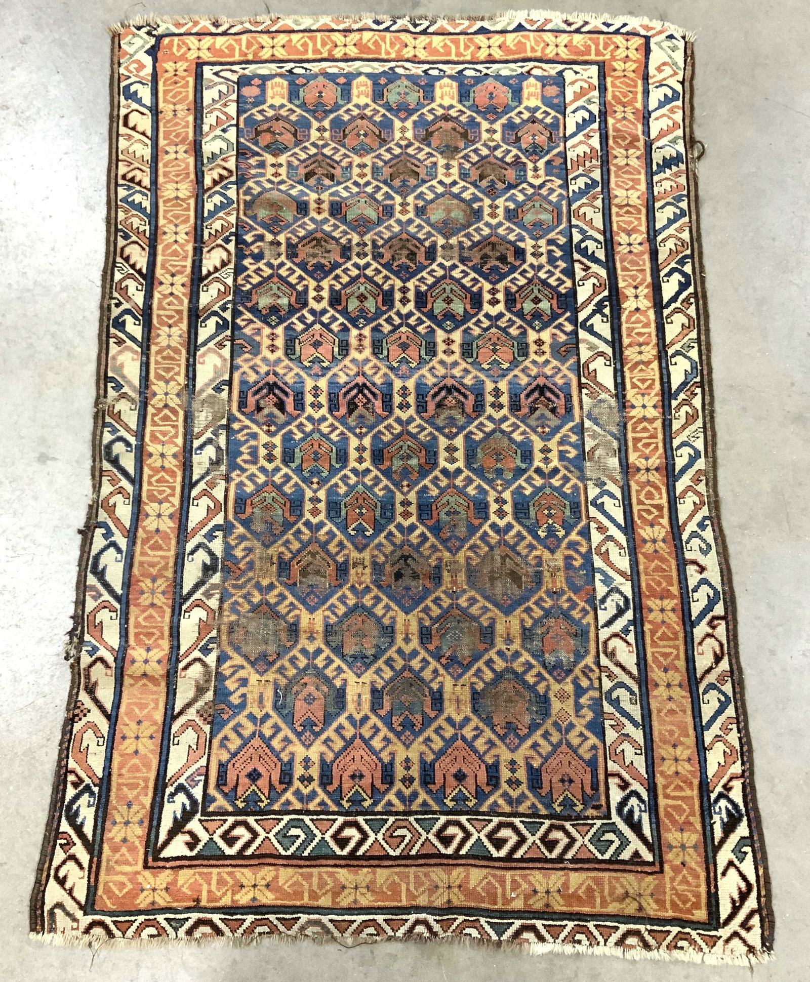 Vintage Handmade Persian Wool Area Rug: Rug is handmade and wool. Piece appears to possibly be KAZAK. Rug has intricate multi toned geometric detail. Piece measures approx 67 inches long 43 inches wide. Rug, carpet, vintage rug, handmade ru