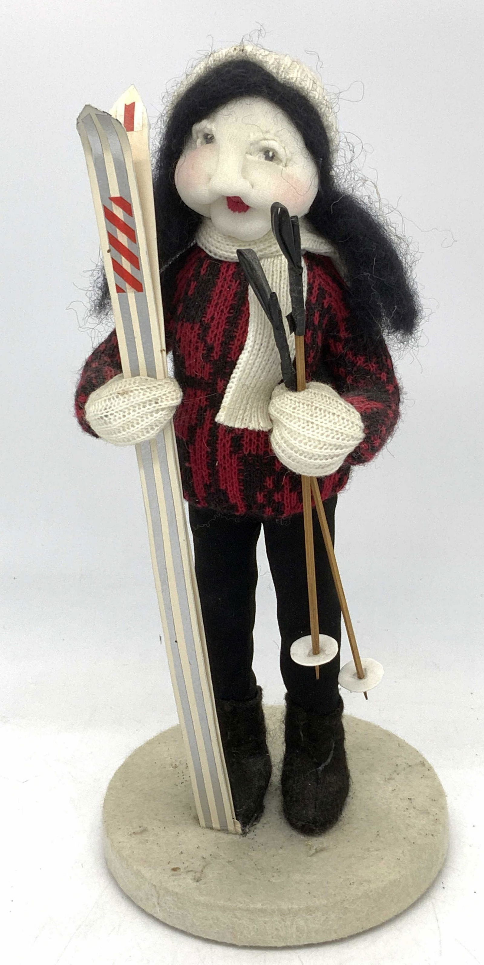 ROBIN HILL Vintage Handmade Ski Doll Figurine, NZ: ROBIN HILL Vintage Handmade Mixed Material Ski Doll Figurine, New Zealand, metal possibly composite skis, wood ski poles, knit clothing, with metalwork and plush interior on felt & composite pedestal,