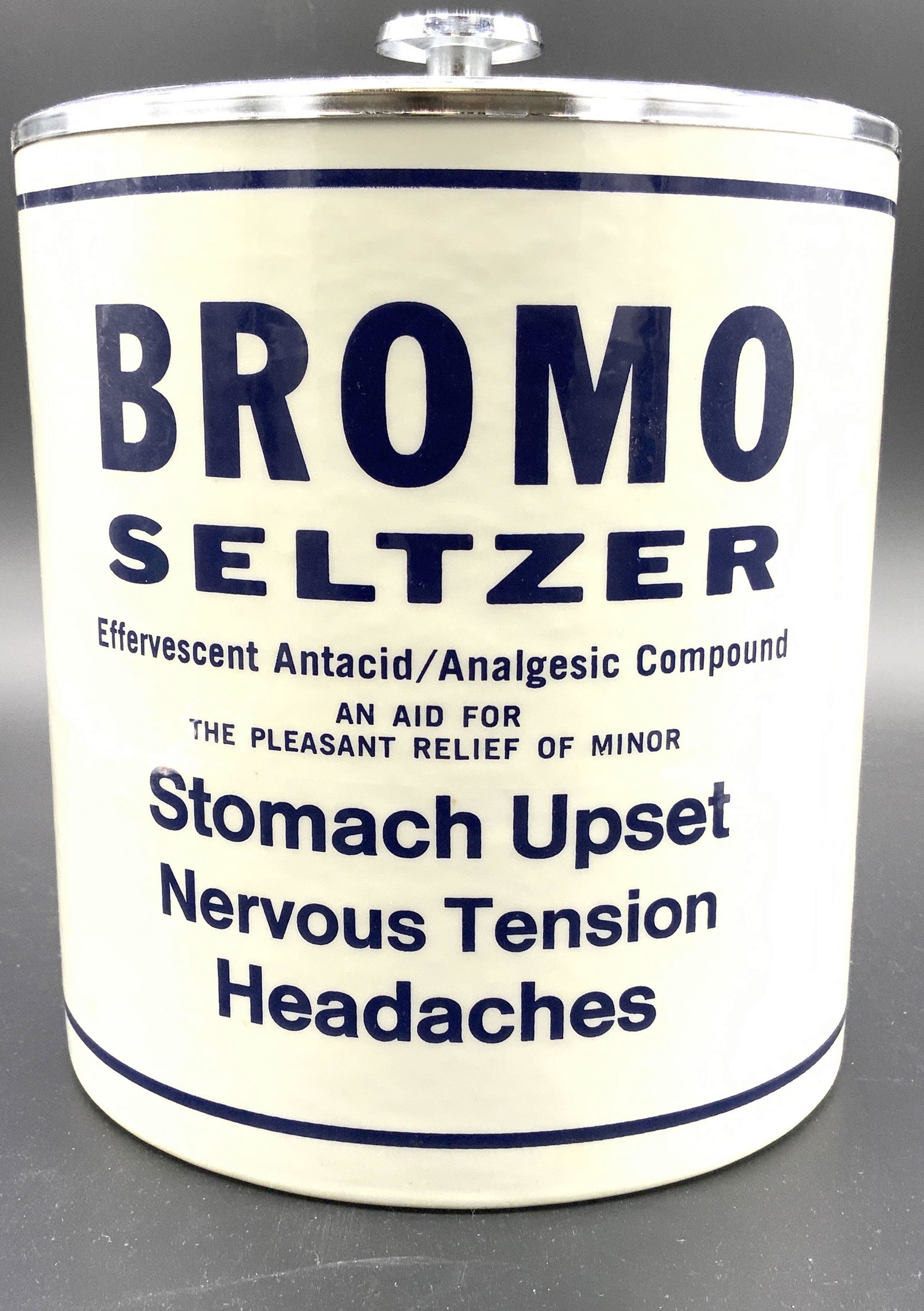 BROMO SELTZER Bucket W Lid: Bucket reads BROMO SELTZER. Piece is white with blue toned lettering. Bucket includes silver toned lid w knob handle. Piece measures approx 9 inches tall 8 inches wide. BROMO seltzer, BROMO seltzer bu
