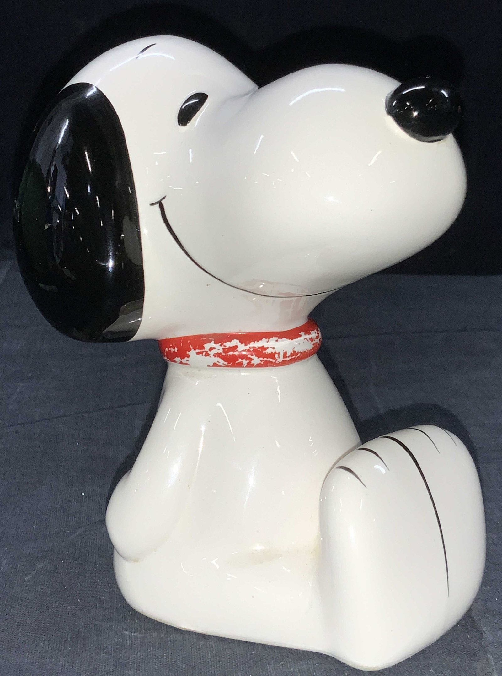 Vintage Ceramic SNOOPY Coin Bank C. 1958, Japan: Vintage ceramic Snoopy dog Coin bank. Depicting a sitting Snoopy with a coin slot on backside of his head. Marked on underside Made in Japan, Snoopy, c, 1958 1966, untied Featured, Syndicate, Inc. app