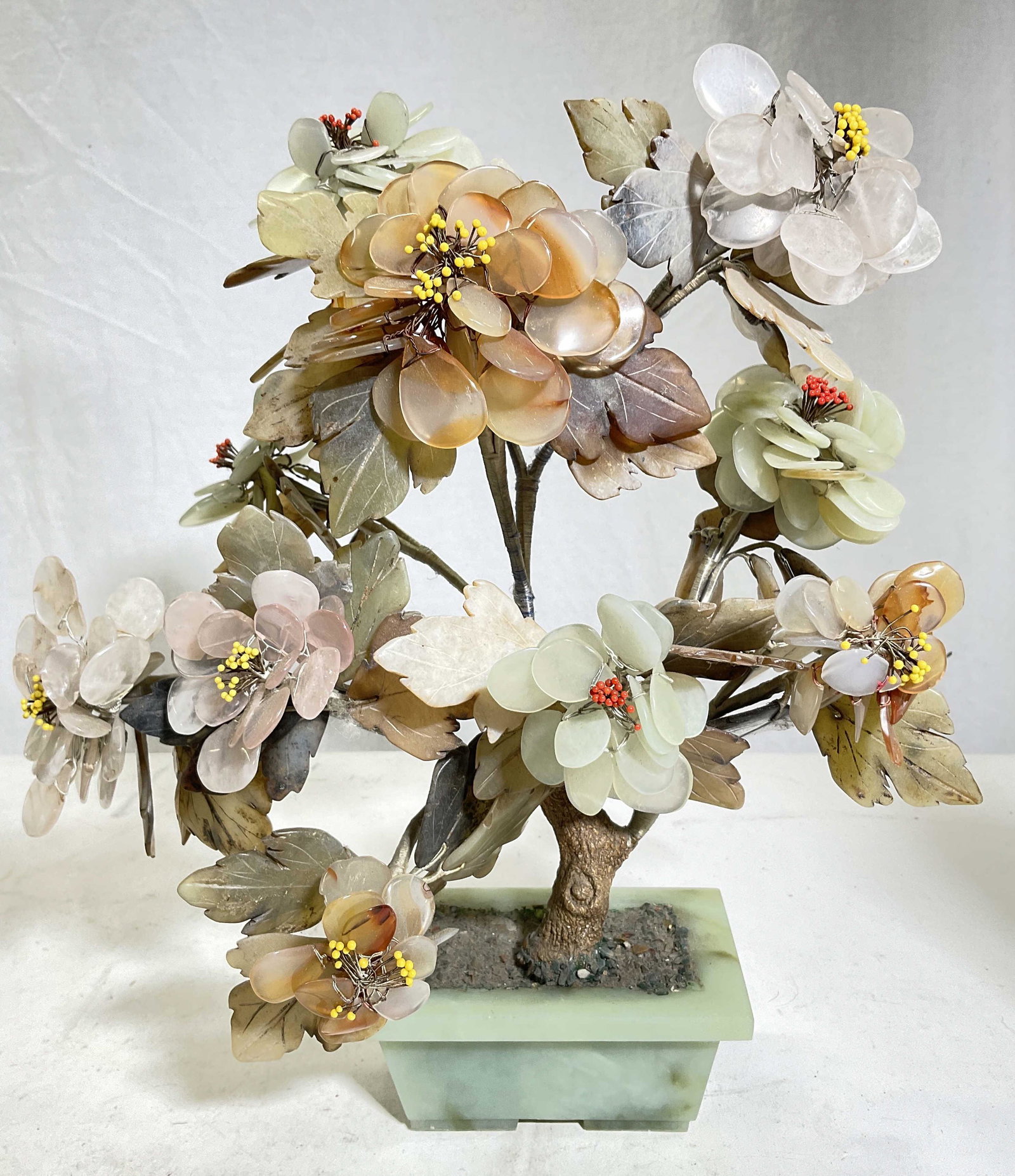 Asian Style Natural Stone Tree: Tested positive on Gem tester for natural stone. Base is possibly Jade. Pieces of natural stone are affixed with wire. Natural qualities and colorization to stones. Surface wear consistent with age an
