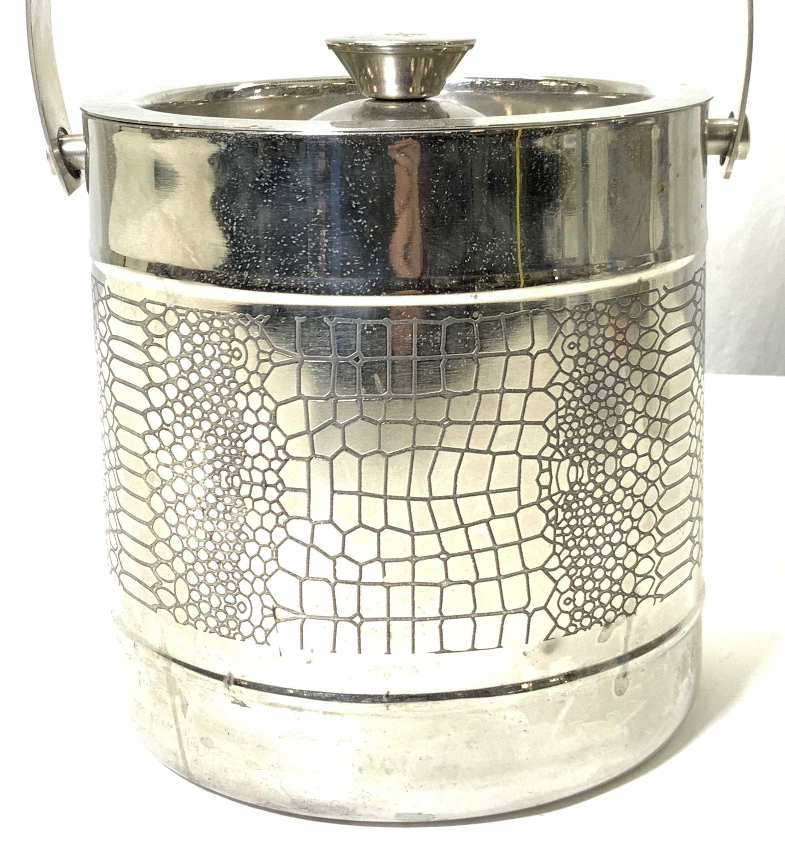 GODINGER Silver Plated Vintage Ice Bucket: A vintage Silver plated vintage ice bucket with handle, etched with a reptile pattern on band around the exterior. Marked on underside, Godinger, Godinger Silver Art. Co. LTD. Made in India. Approxima