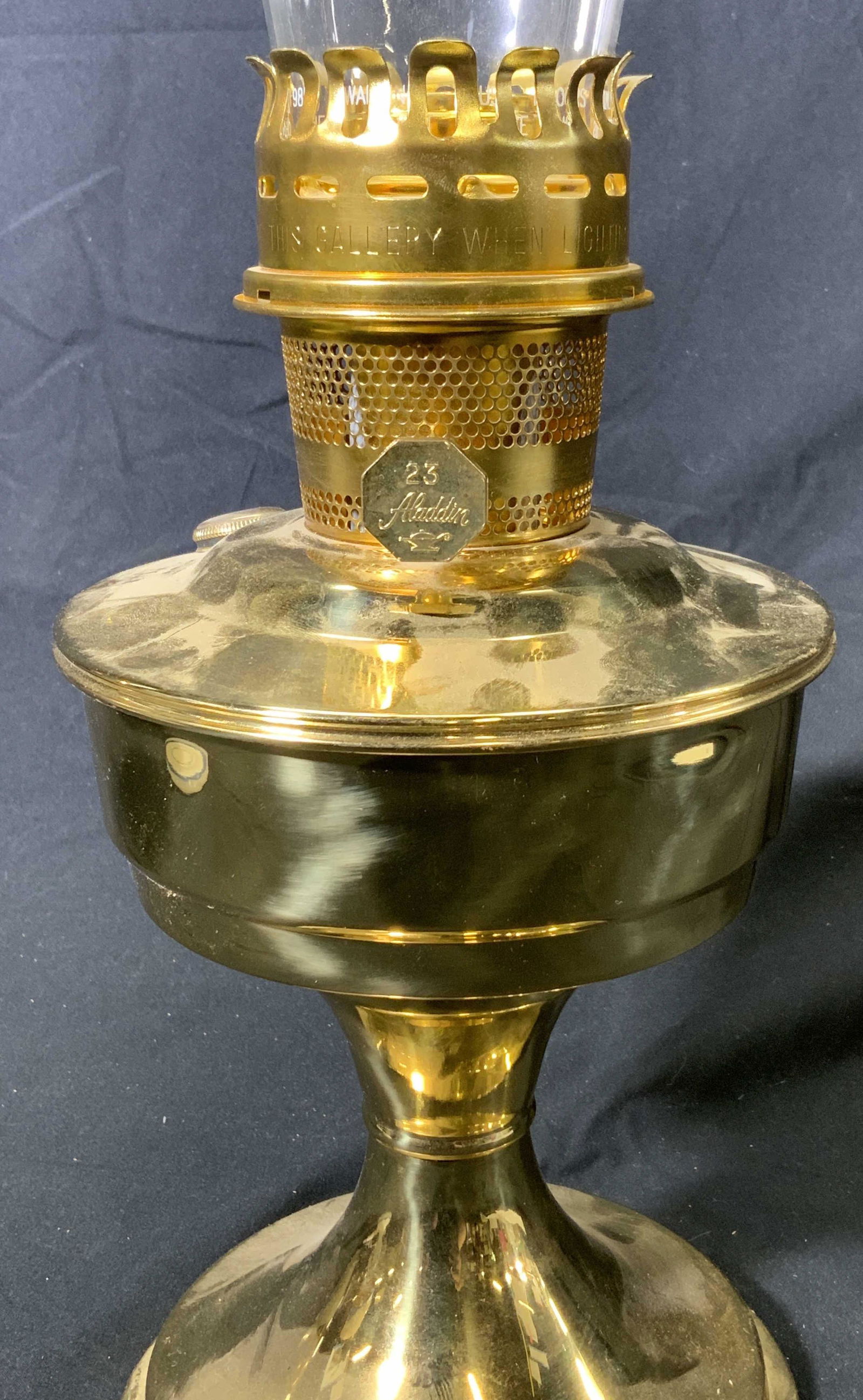 ALADDIN Vintage Brass Oil Lamp: Vintage Aladdin 23 brass oil lamp. In good vintage condition. Measures approx. 23.75 inches tall and 6.5 inches diameter. Aladdin lamp, Aladdin oil lamp, vintage oil lamp, vintage fluid lamp, tabletop