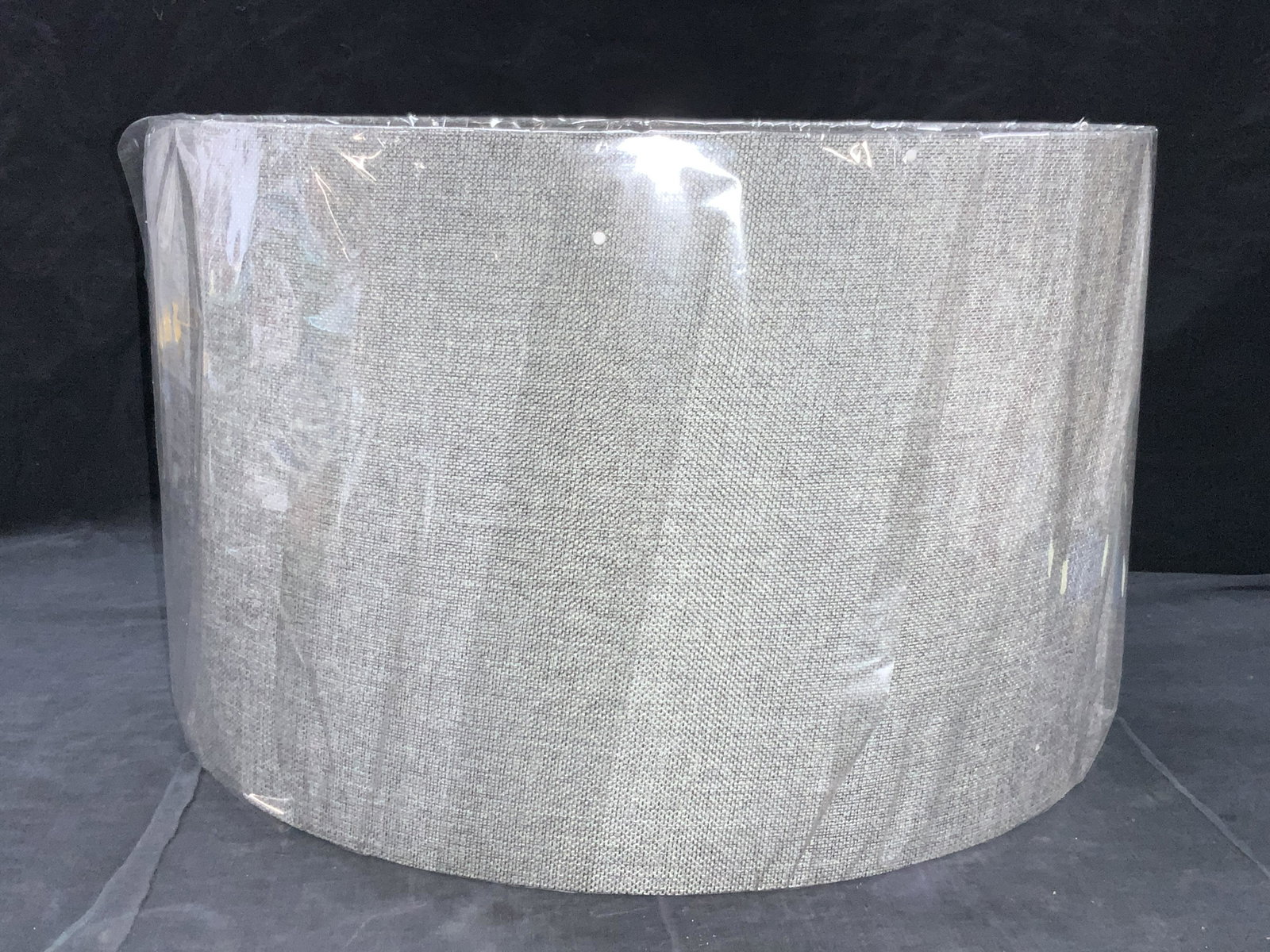 Gray Stitch textured Drum Lampshade, New: New, drum lamp shape with gray stitch pattern on exterior with a white interior tone. Approximately 18 inch diameter and 11 inches tall. Comes in protective plastic. Never viewed outside of plastic. L