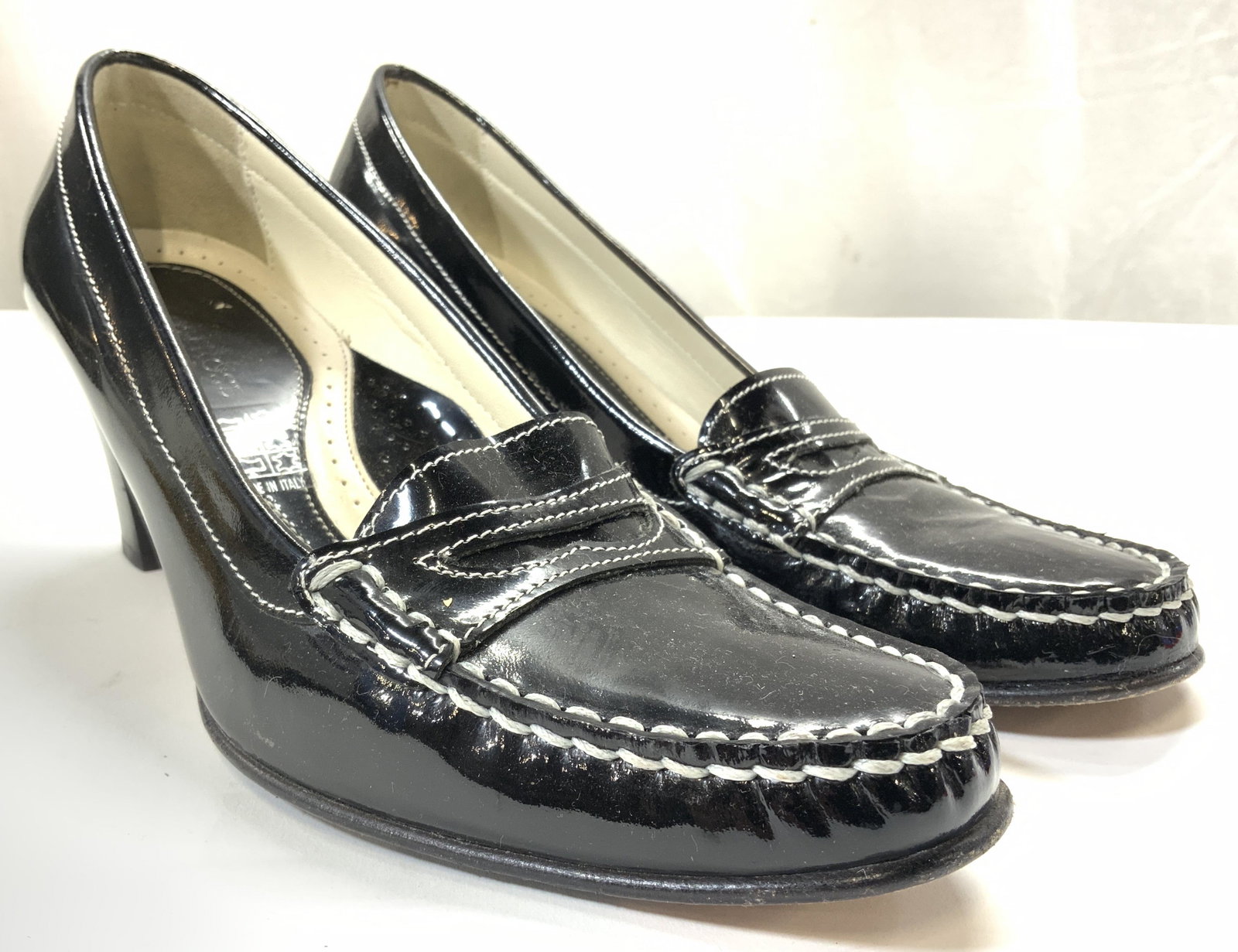 TARYN ROSE Patent Leather Heels Sz 37.5 EUR: Inner sole reads TARYN ROSE MADE IN ITALY. Underside is inscribed. Heel exteriors are black toned patent leather. Heels are 2.5 inches high. Heels, black heels, womens heels, womens shoes, womens foot