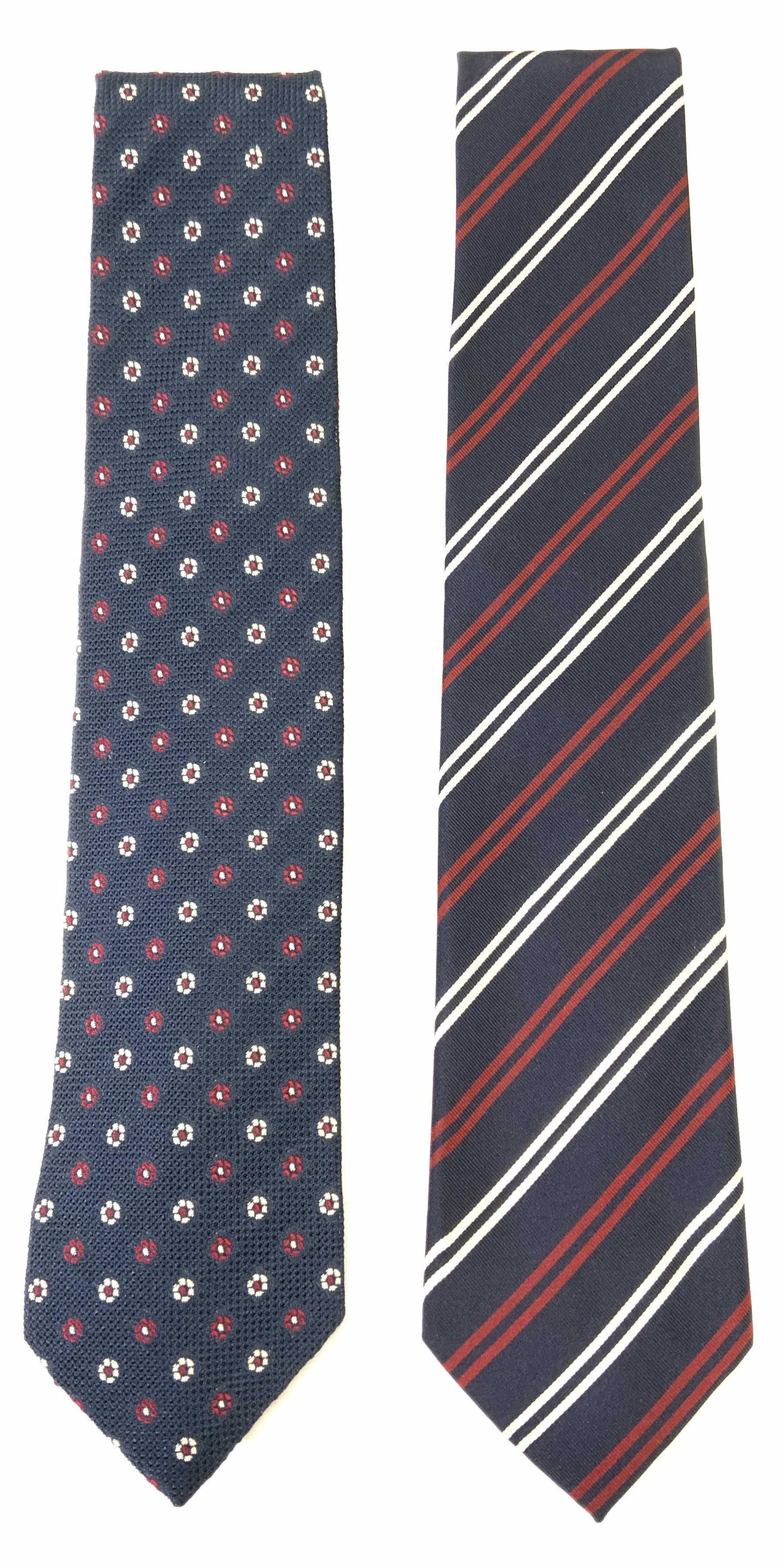 DRAKES Luxury Silk/Silk Blend Navy Blue Ties: Two Navy Blue ties with patterns by Drakes. One navy blue tie with red and white floral embroidery, 100% silk, measures approx. 58 inches. One navy blue with with red and white striped pattern, silk b