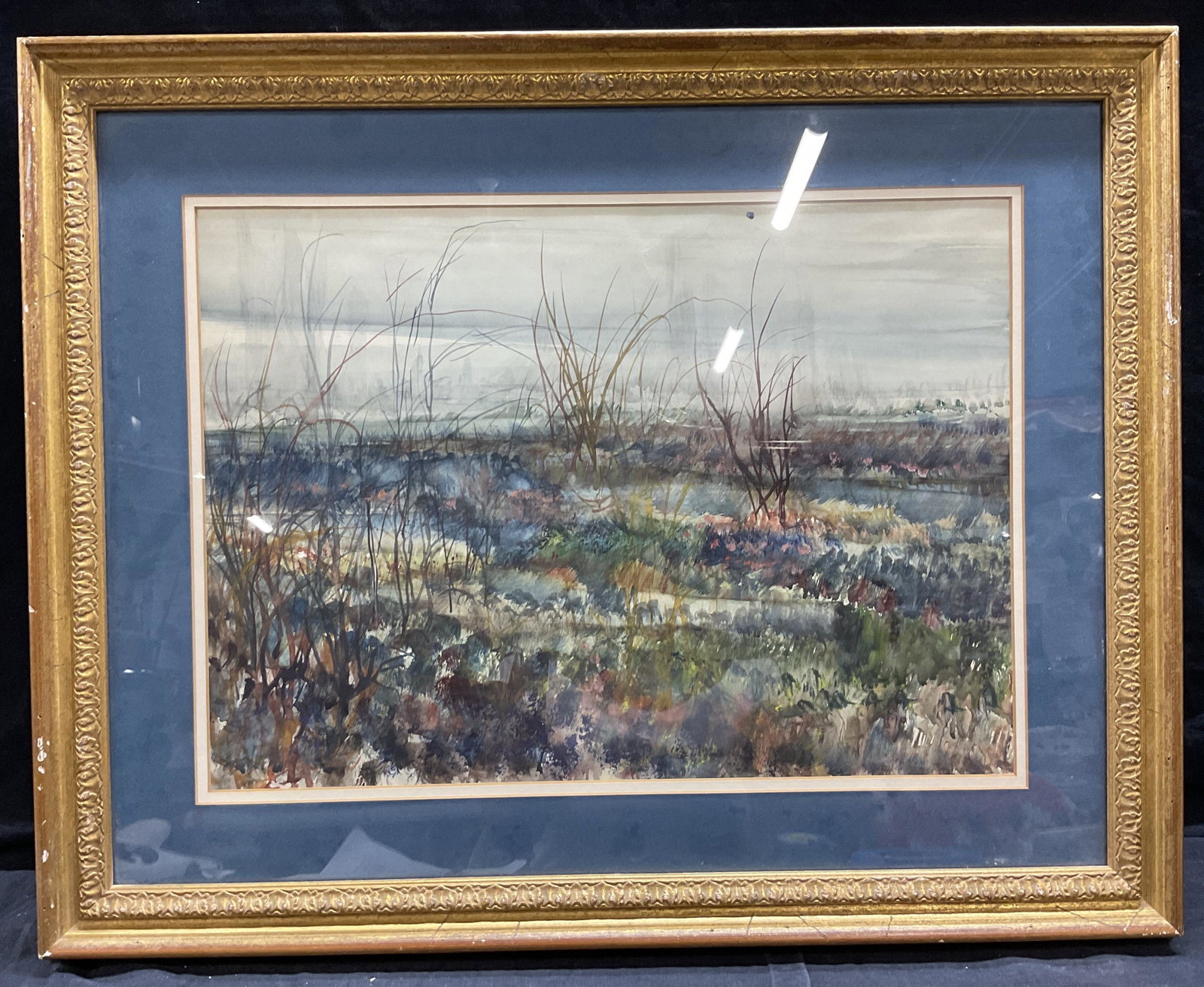 Signed Watercolor Painting 1992, Landscape: Signed Watercolor Painting 1992, Landscape, signature to lower right illegible, date reads 92, subject multi colored grasslands, measures 21 1/2 x 26 3/4 inches, gilt wooden frame, surface wear to fra