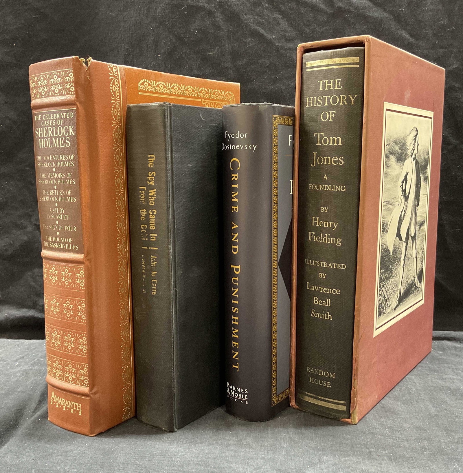 Lot 4 Mystery and Comedy Novels: Lot 4 Mystery and Comedy Novels, titles read The Celebrated Cases of Sherlock Holmes Amaranth Press, The Spy Who Came in from the Cold John le Carre, Fyodor Dostoevsky Crime & Punishment Barnes & Nobl