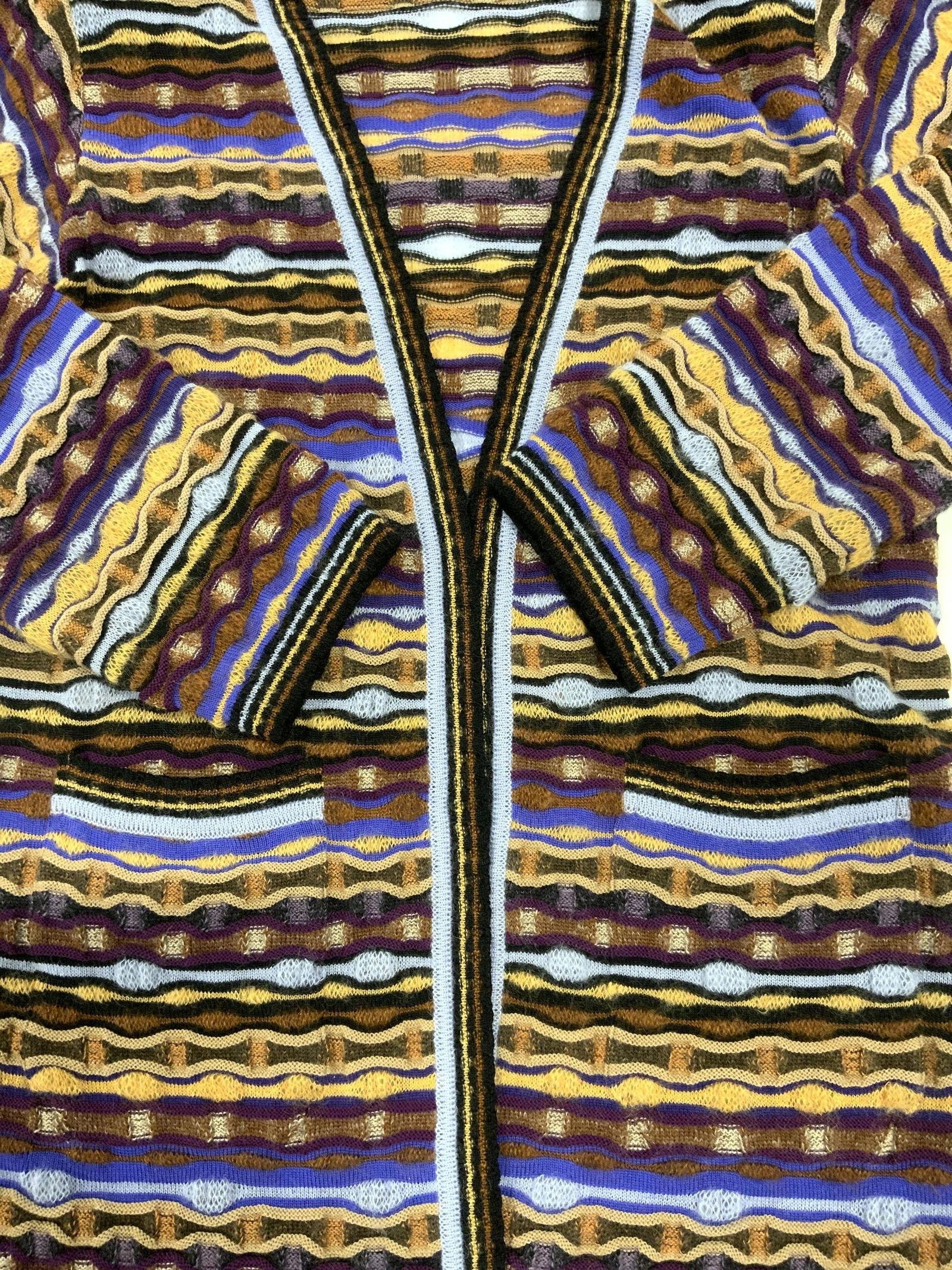 MISSONI Wool Monair Multicolor Cardigan, Italy: MISSONI Wool Monair Blend Multicolor Cardigan, made in Italy, measures approx 37 1/2 x 17 1/2 in., seen in shoulder pads, double hand pockets, brown, black, tan, blue, and purple hues, possibly never