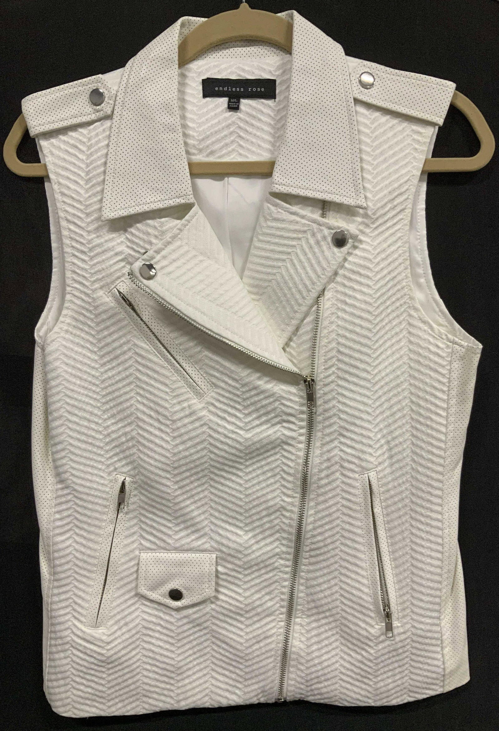 Endless Rose Dressy White Fabric Vest: Signed endless rose vest with silver tone zipper and button snaps, size M/L. Multiple zippered pockets, cotton and pleather ( polyester leather feel). Nicely lined. Possibly not worn, new without tags