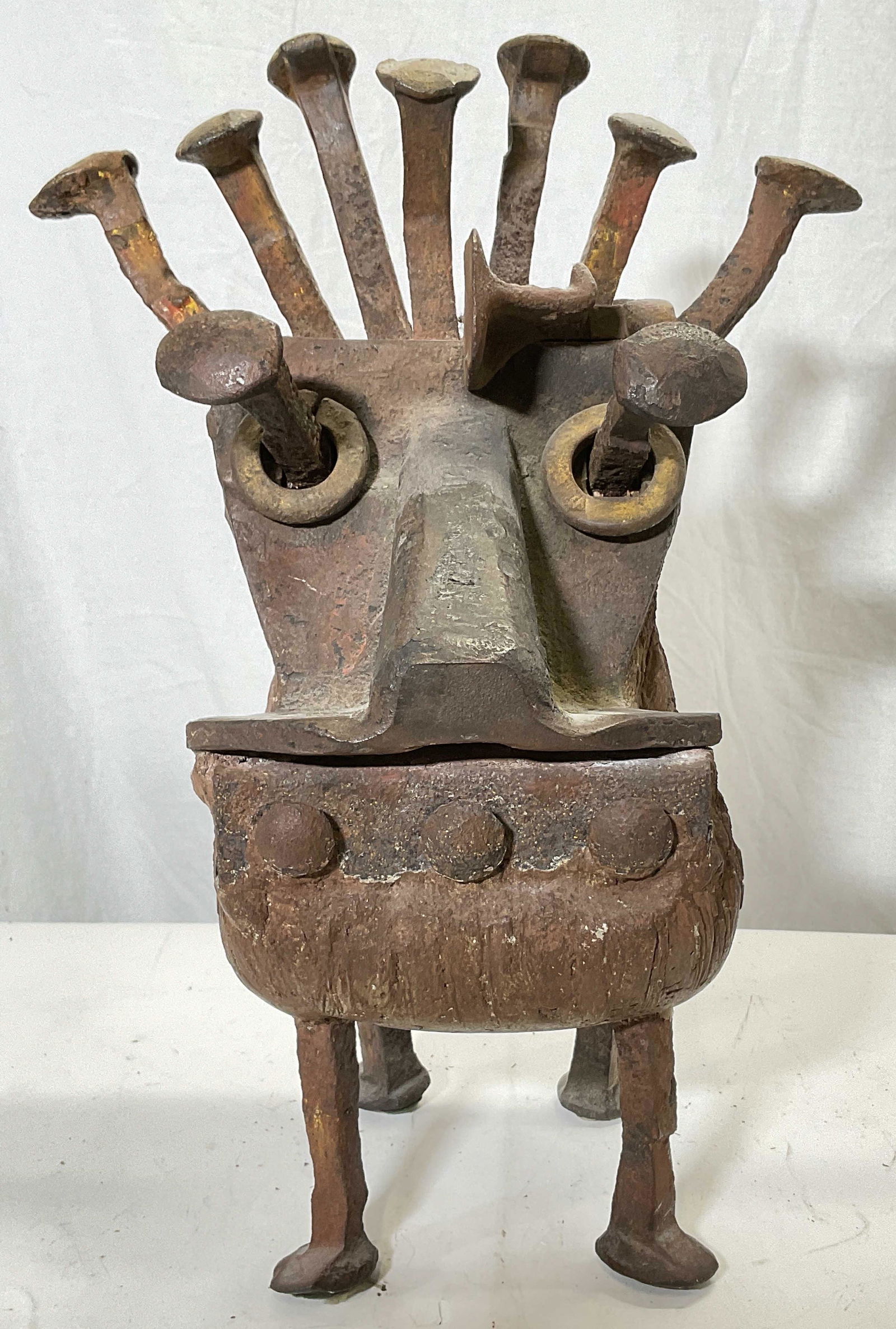 SIGNED Alexandra Merker Metal Sculpture GOAT: Alexandra Merker SIGNED Metal Sculpture GOAT. Ads of metal and other material, this sculpture stands on 4 large metal nails. Measures approx 16.5H x 12W inches. Surface wear consistent with age of scu