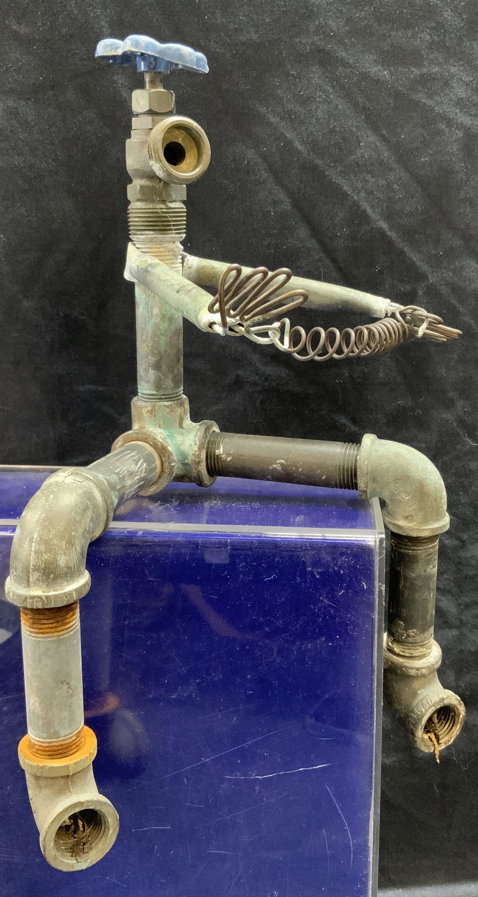 Modern Sculpture of Man Playing Accordion (1 of 4)