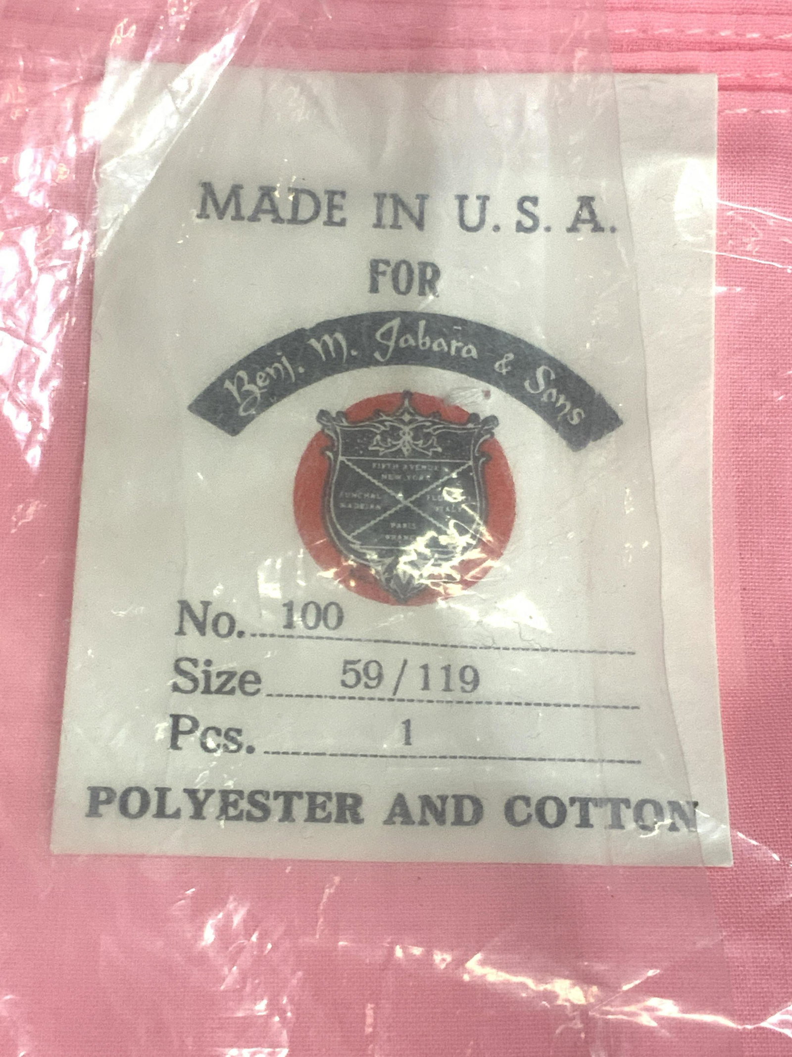 JABARA & SONS Vintage Pink Linens, Original Pack: Pink linens contained in original packaging. Obverse reads MADE IN USA FOR JABARA & SONS, SIZE 59/119, POLYESTER & COTTON. Reverse possesses Bloomingdales sticker. Not examined out of packaging. Measu