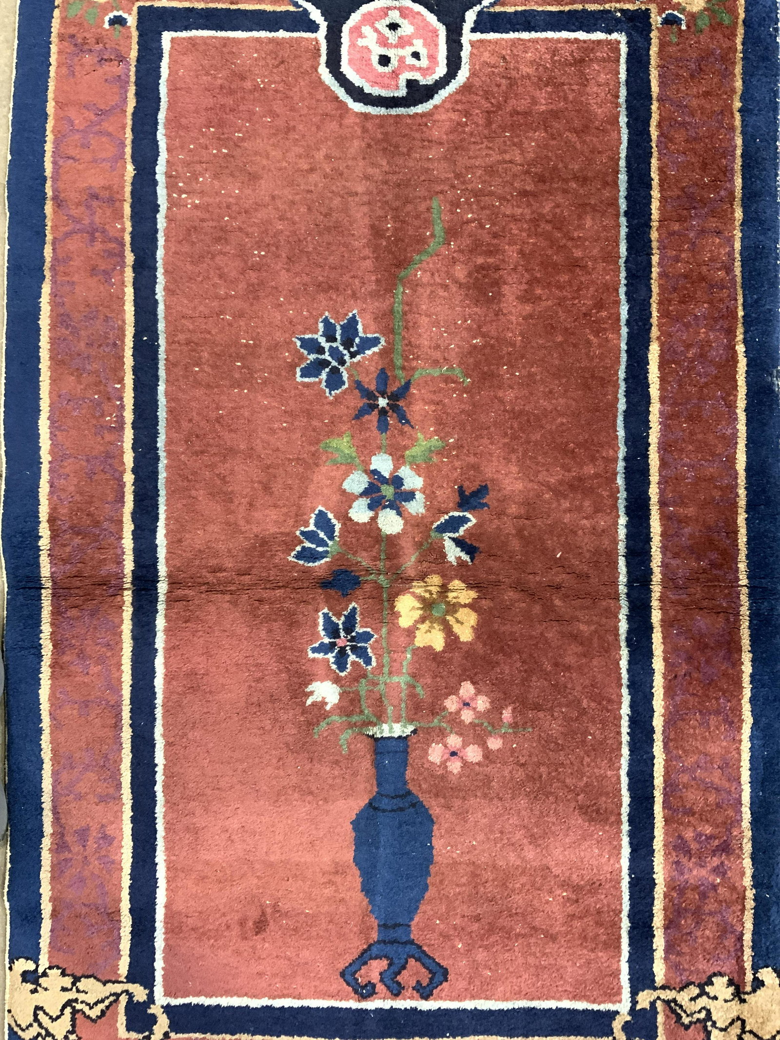 Vintage Handmade Chinese Art Deco Wool Rug: Rug is handmade and wool. Piece is vintage possibly antique. Rug has multi toned floral, leaf, vase & geometric detail. Rug measures approx 59 inches long 36 inches wide. Rug, carpet, vintage rug, Chi