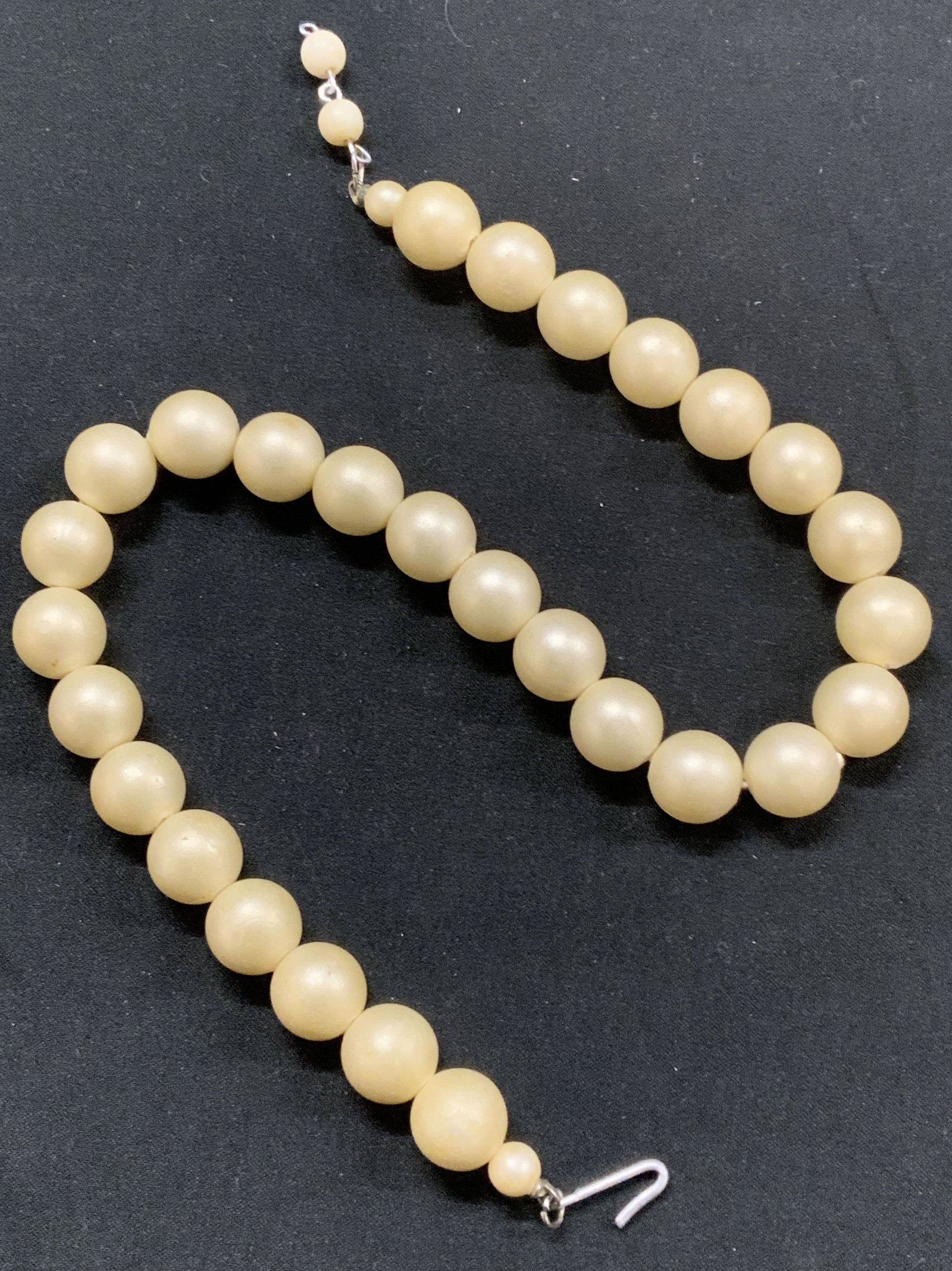 Vintage Pearlescent Beaded Choker Necklace: Vintage beaded pearlescent choker necklace with hook clasp. Wear consistent with age and exposure. Measures approx. 13.5 inches long. Pearlescent necklace, pearlescent choker necklace, choker necklace