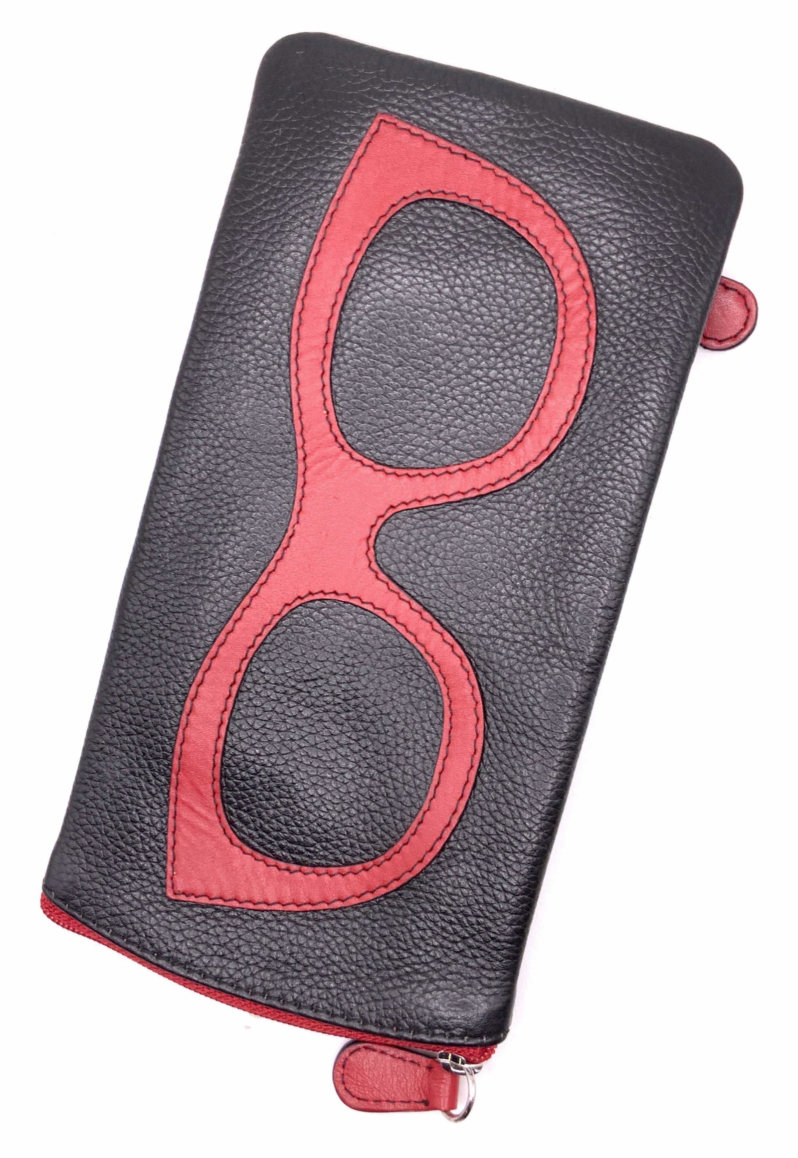 Genuine Leather Red Sunglasses Motif Zippered Case: A black leather case with a raised, sewn on red sunglasses motif to the obverse. Zipper closures. Tag to interior reads GENUINE LEATHER, NEW YORK. Some wear consistent with use. Measures approx 4L x 7