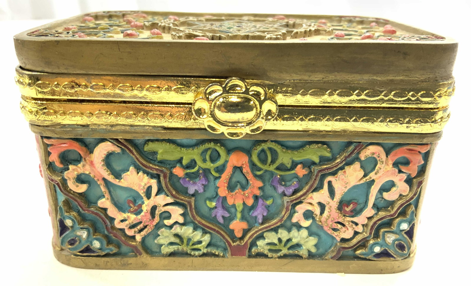 Composite Judaica Hebraica Keepsake Box: Keepsake box has Star of David detail on lid. Piece app to be composite possibly bone. Box has intricate multi toned floral, vine, and leaf detail. Piece measures approx 3.5 inches long 2.25 inches de