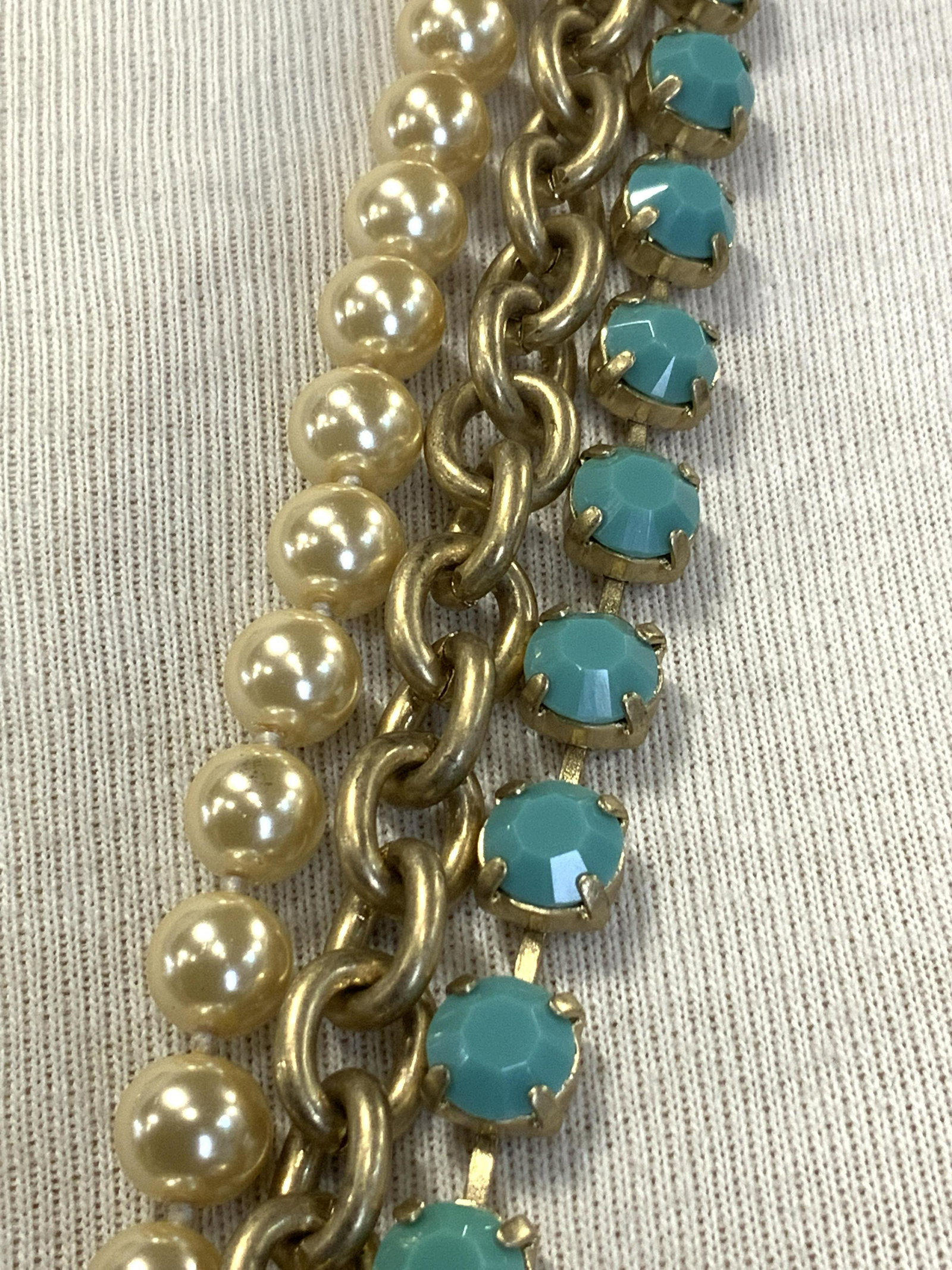 ABS TriStrand Beaded Necklace NWT: ABS TriStrand Beaded Necklace NWT, turquoise hue faceted beads, gold toned link strand, pearlescent bead strand, lobster claw clasp, drop measures approx 18 in. long. ABS tristrand beaded necklace NWT