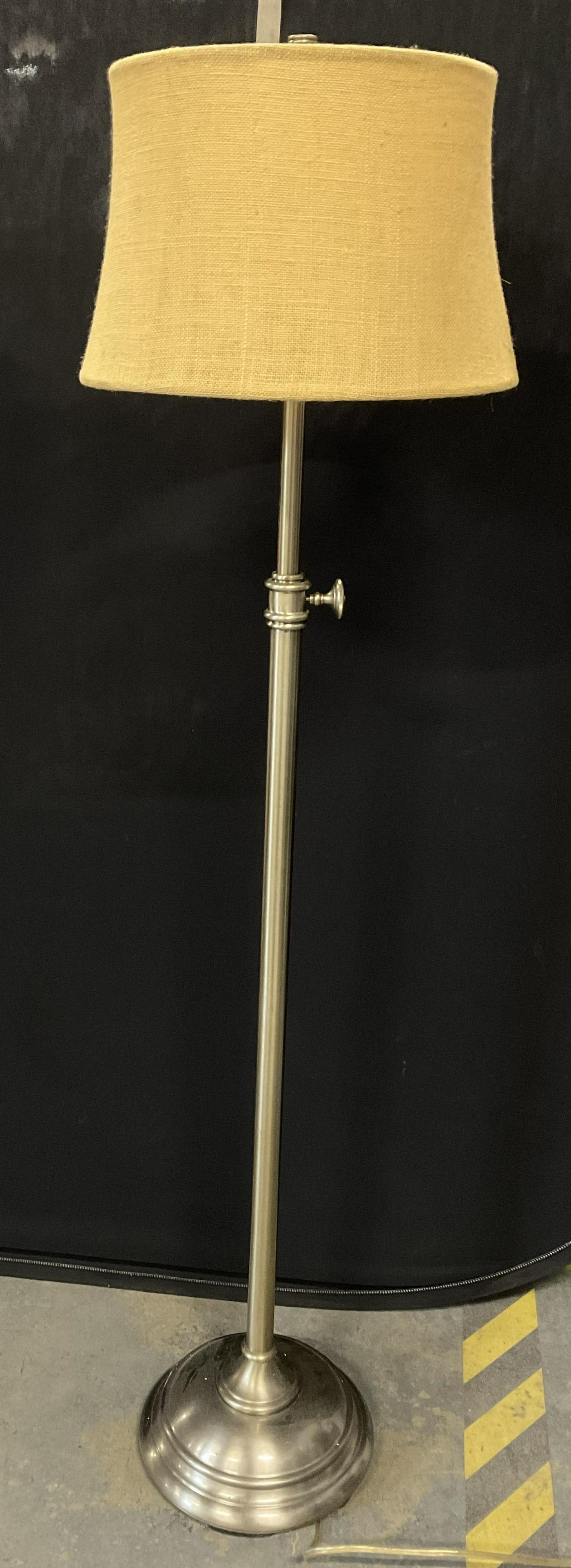 Adjustable Floor Lamp W Burlap Style Shade: Burlap lamp shade. Chrome toned base to piece. Surface wear to piece consistent with age and use of lamp. Measures approx 59 inches but lamp is adjustable and can be taller or shorter. Lighting, light