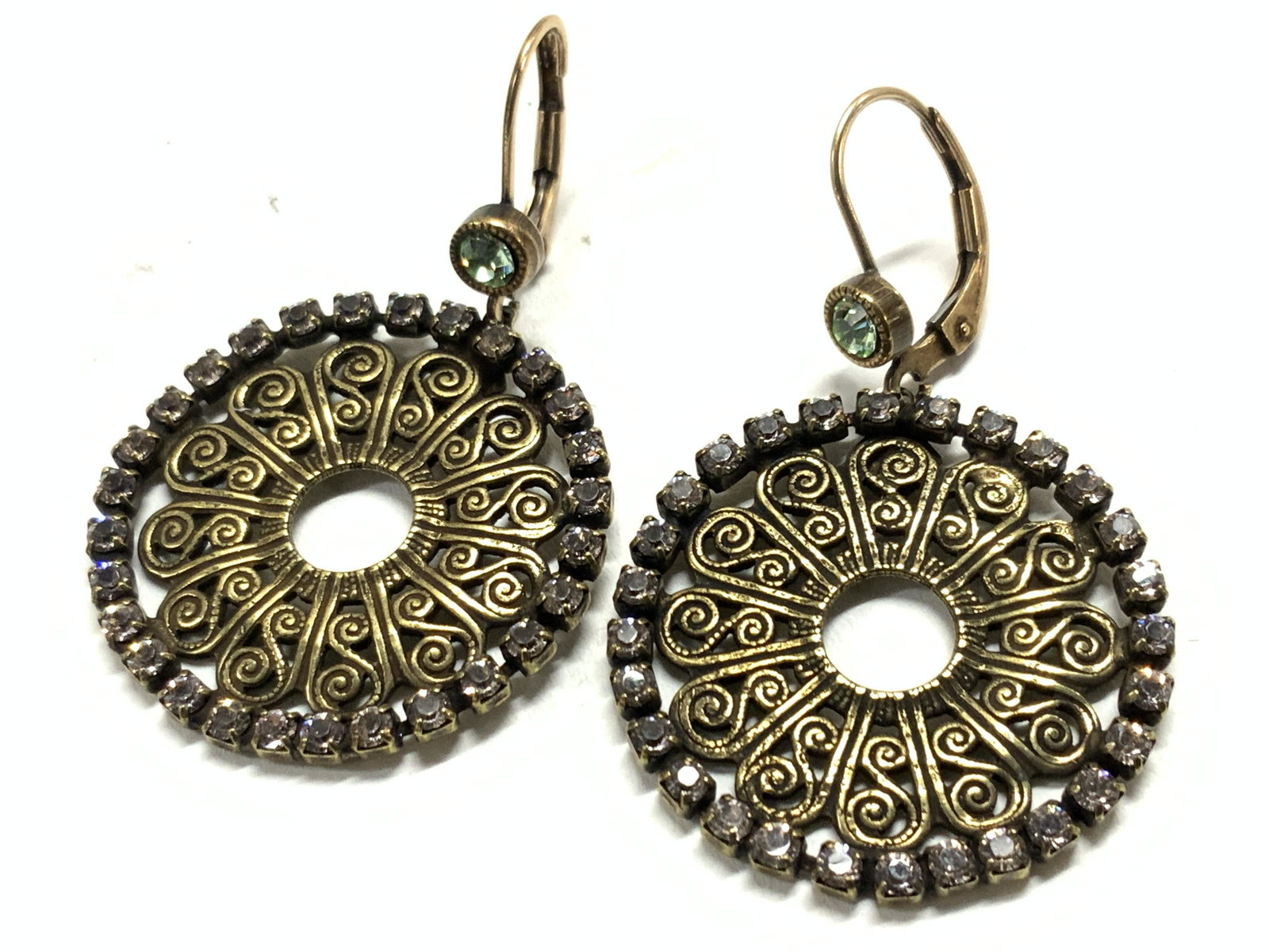 LIZ PALACIOS 14KT Gold Filled Earrings: Pair of drop earrings with circular charms with halos of faceted crystals. 14 Kt gold filled lever backings, marked 1/20 14 KT. Comes with Liz Palacios retail display card and marked Swarovski crystal
