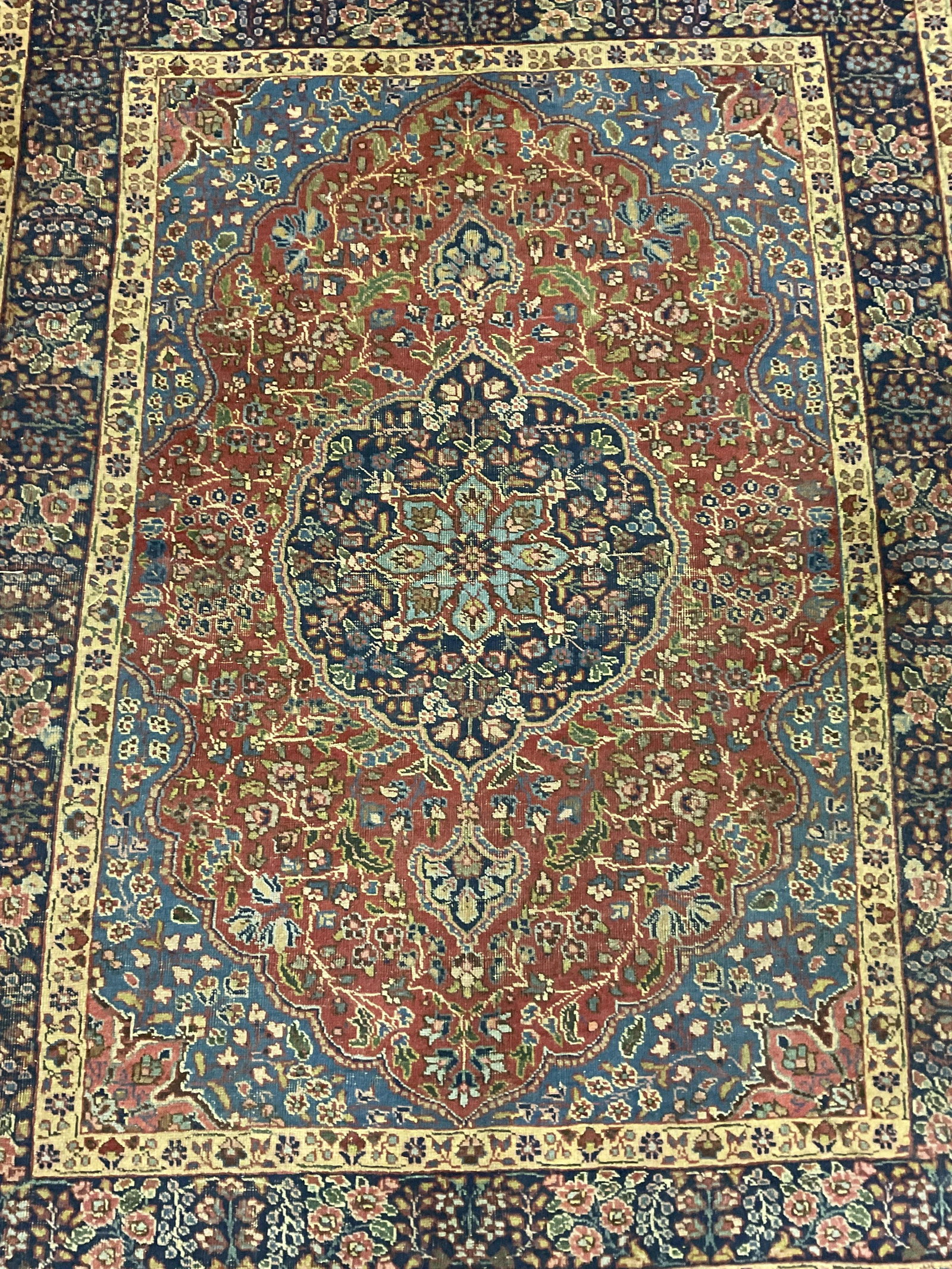 Floral Persian Style Rug: Floral Persian Style Rug, dark colors to piece with flower details. Measures approx 72 x 56 inches. Wear to rug consistent with age & use. Rug, carpet, area rug, home floor decor, home accessories, fl
