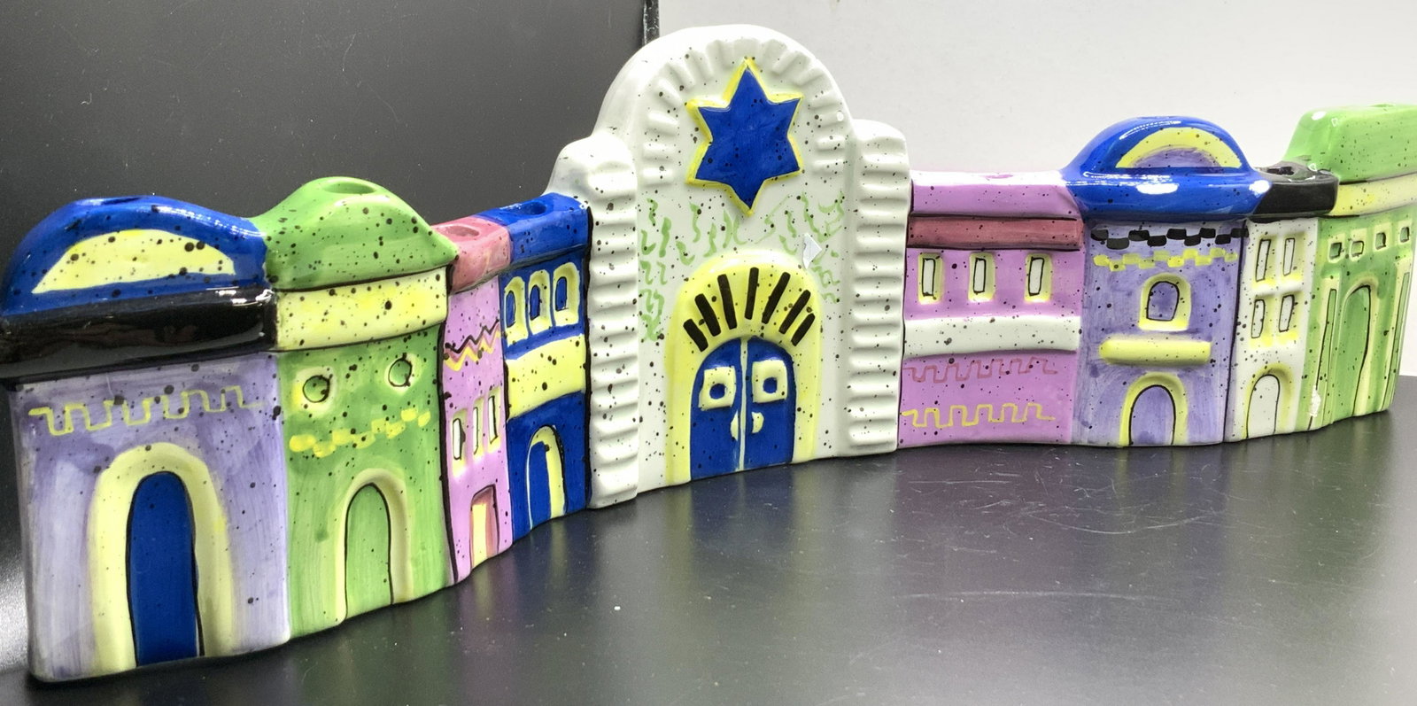 GiftCo Village Panorama Ceramic Menorah Hanukkah: Hand Painted Cermic Judaica Villegas panorama, High gloss finish, making cleaning candle wax eas. Perfect first menorah or add this to you collection. Impressed maker GiftCo on backside. a couple glaz