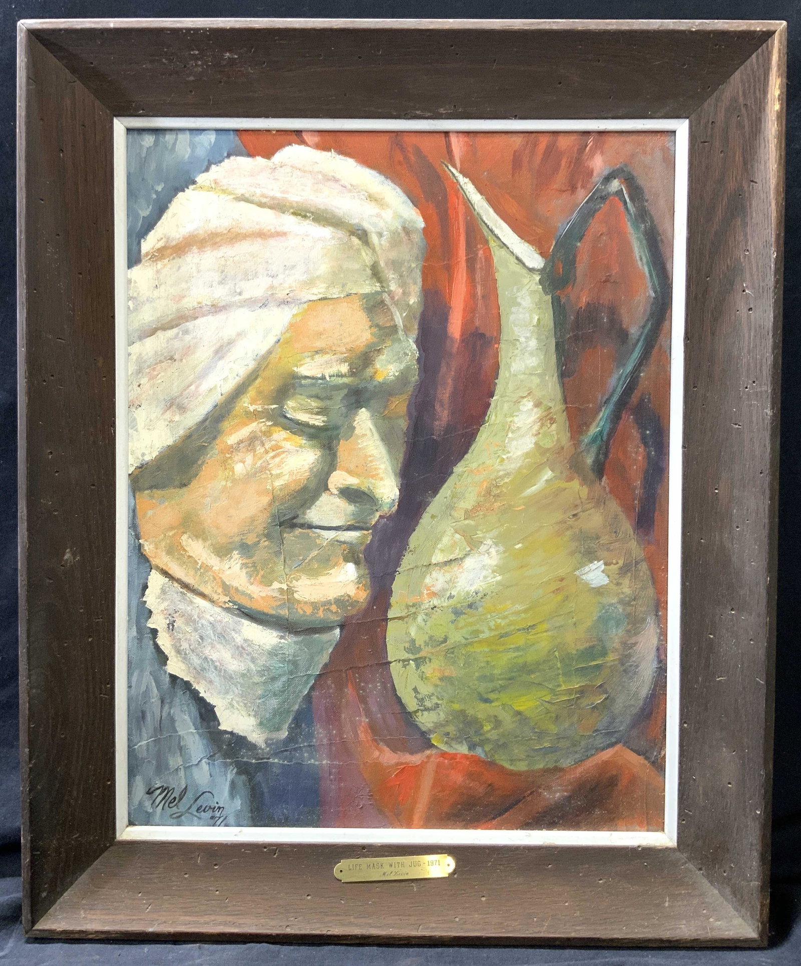 MEL LEVIN Life Mask With Jug 1971: MEL LEVIN Life Mask With Jug 1971, inscription to lower left reads Mel Levin 71, plaque on frame reads Life Mask With Jug - 1971 Mel Levin, subject shows impression of a face next to a jug. Frame meas